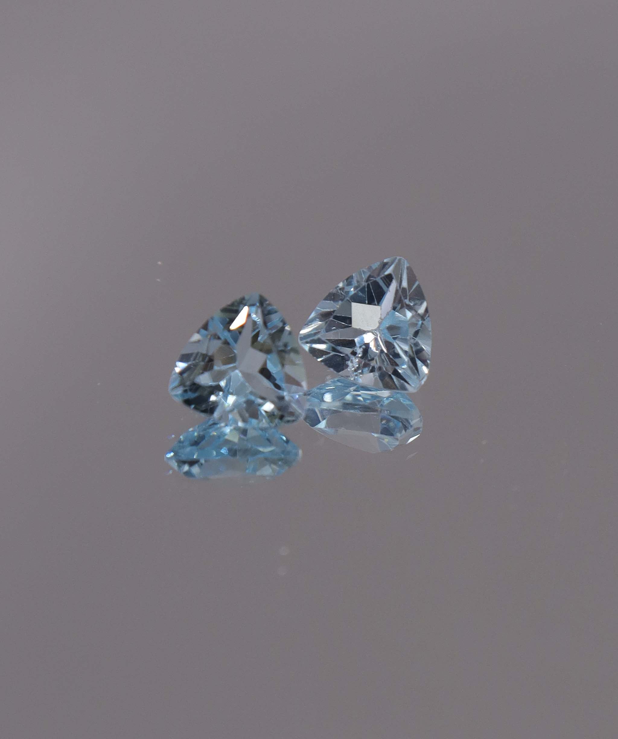 Luxury Promise 2.50ct Sky Blue Topaz Trillion pair DXBCS1217