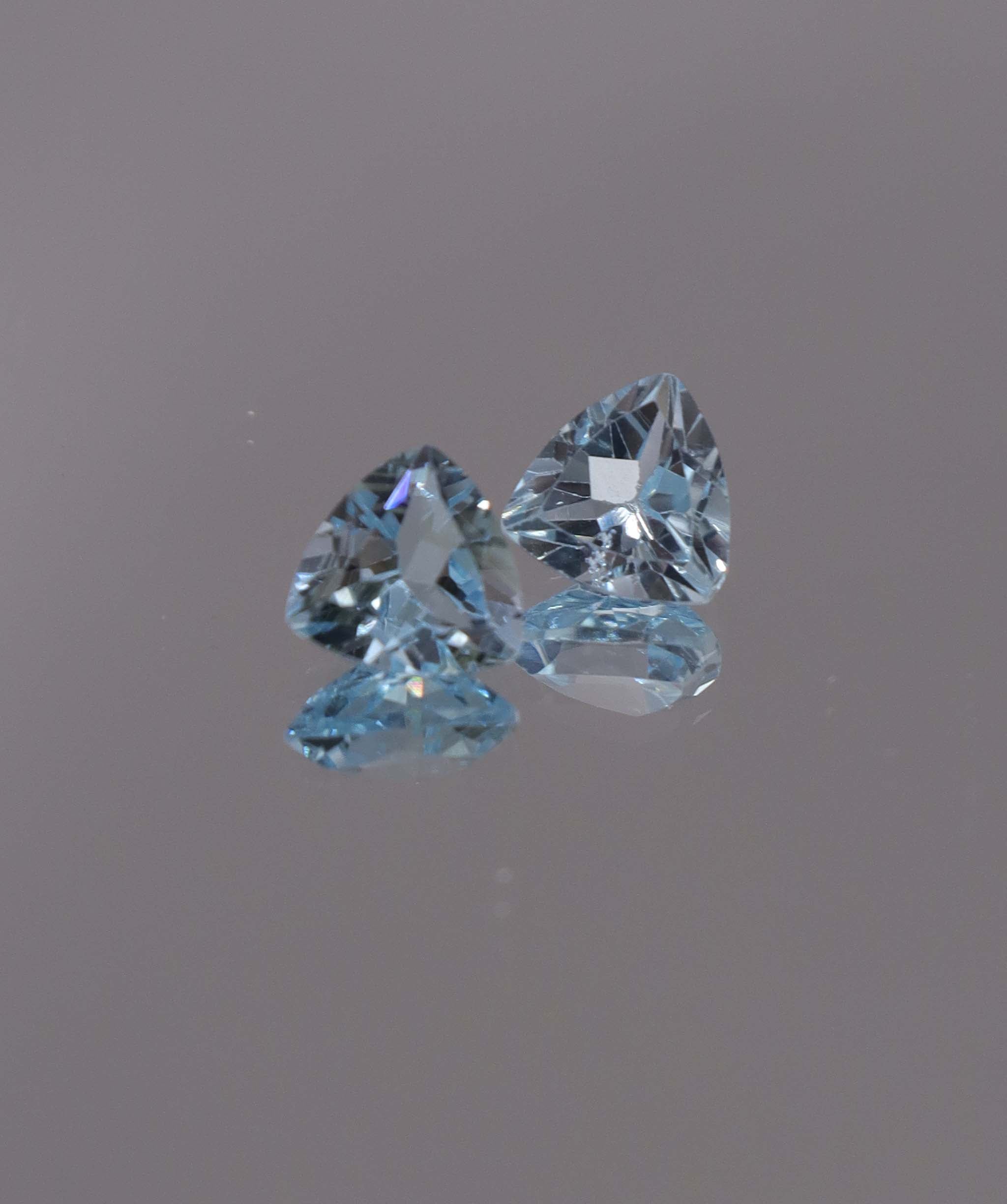 Luxury Promise 2.50ct Sky Blue Topaz Trillion pair DXBCS1217