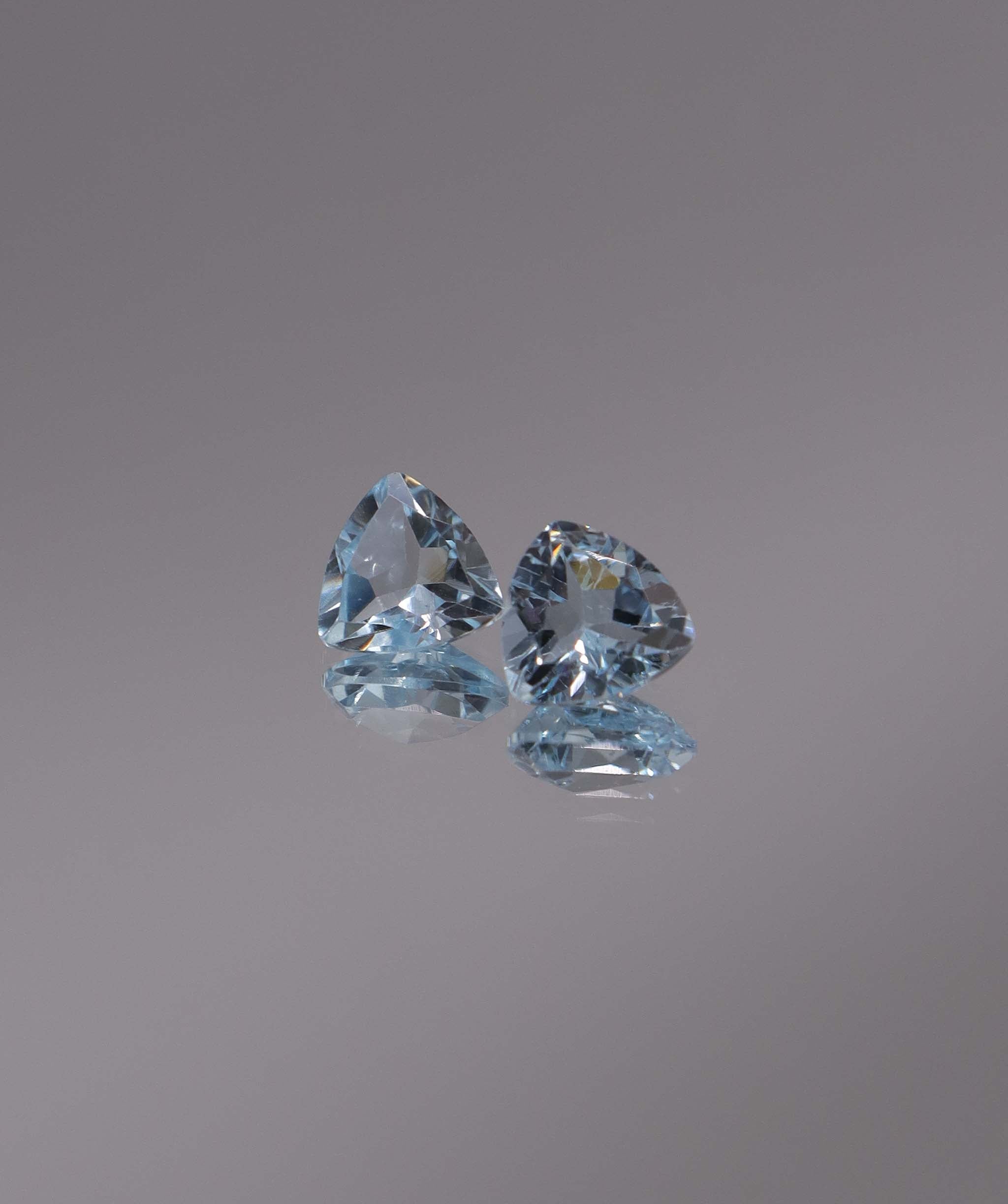Luxury Promise 2.50ct Sky Blue Topaz Trillion pair DXBCS1223