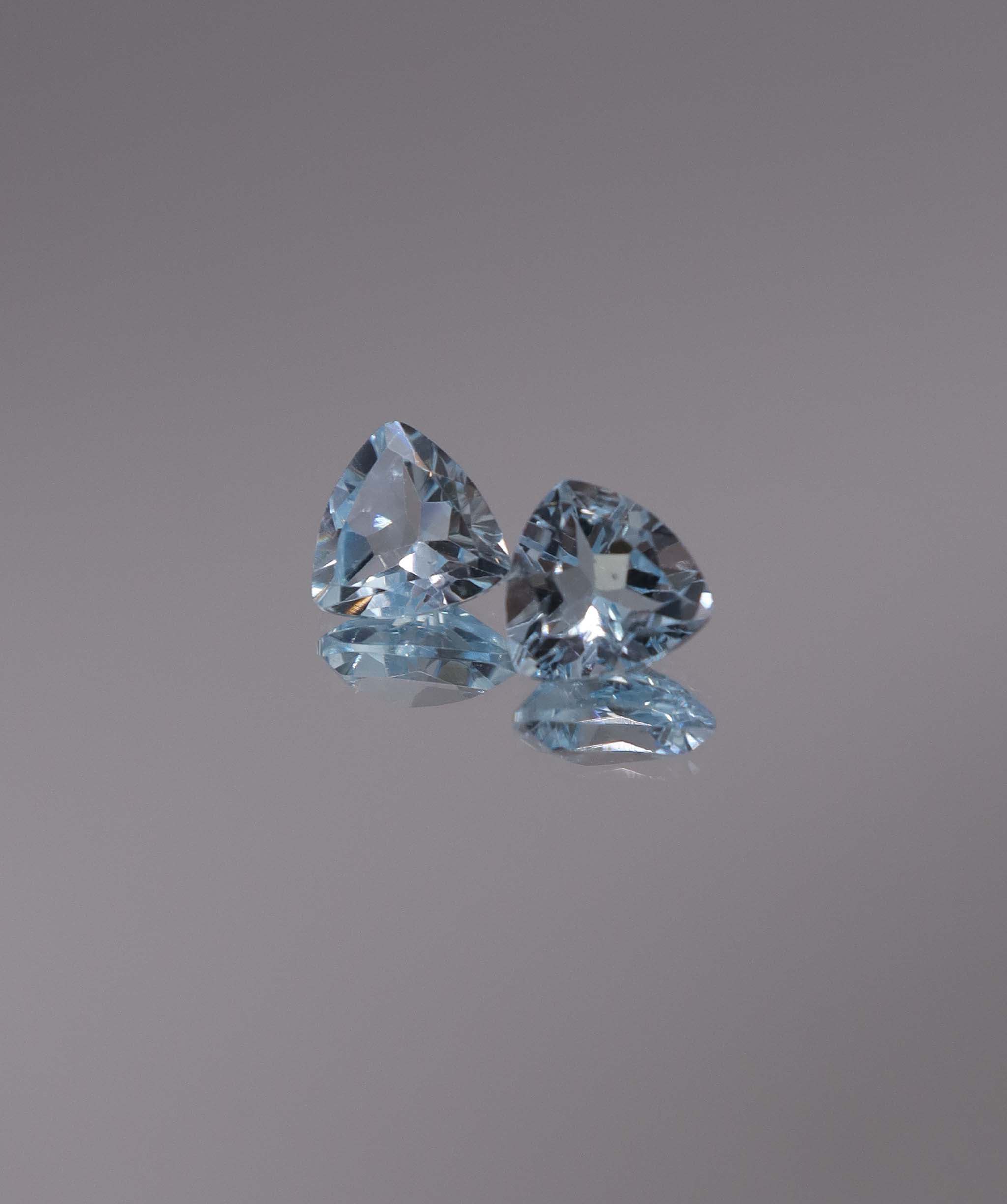 Luxury Promise 2.50ct Sky Blue Topaz Trillion pair DXBCS1223