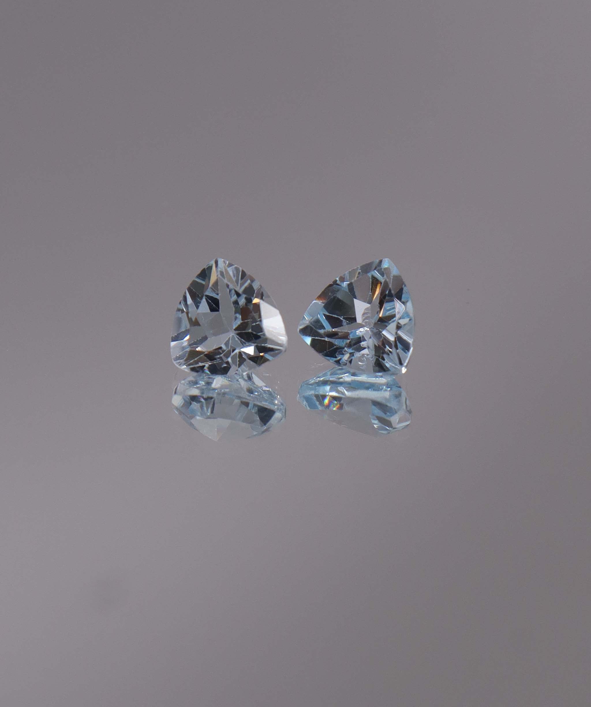 Luxury Promise 2.81ct Sky Blue Topaz Trillion pair DXBCS1216