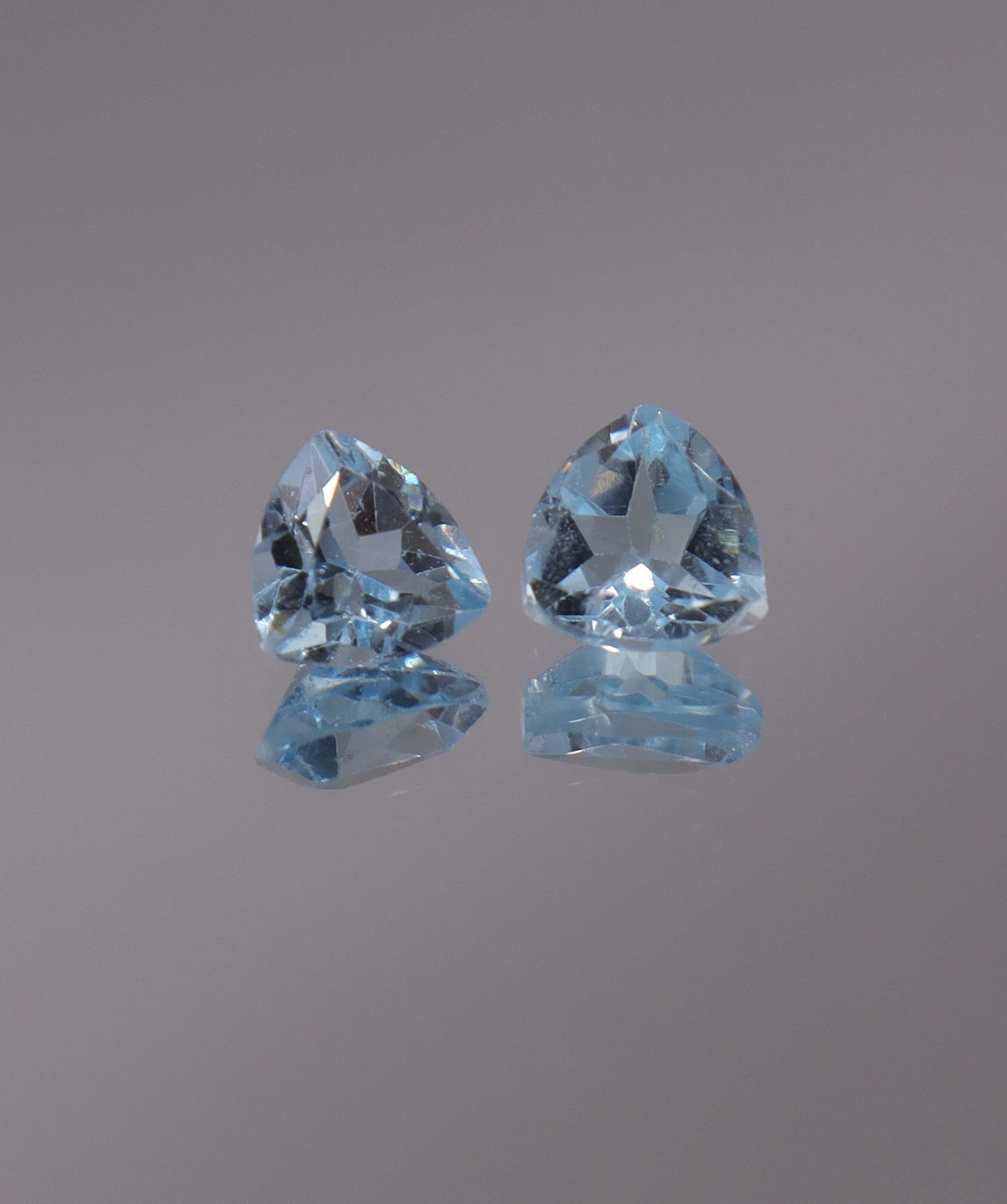 Luxury Promise 3.06ct Sky Blue Topaz Trillion pair DXBCS1212
