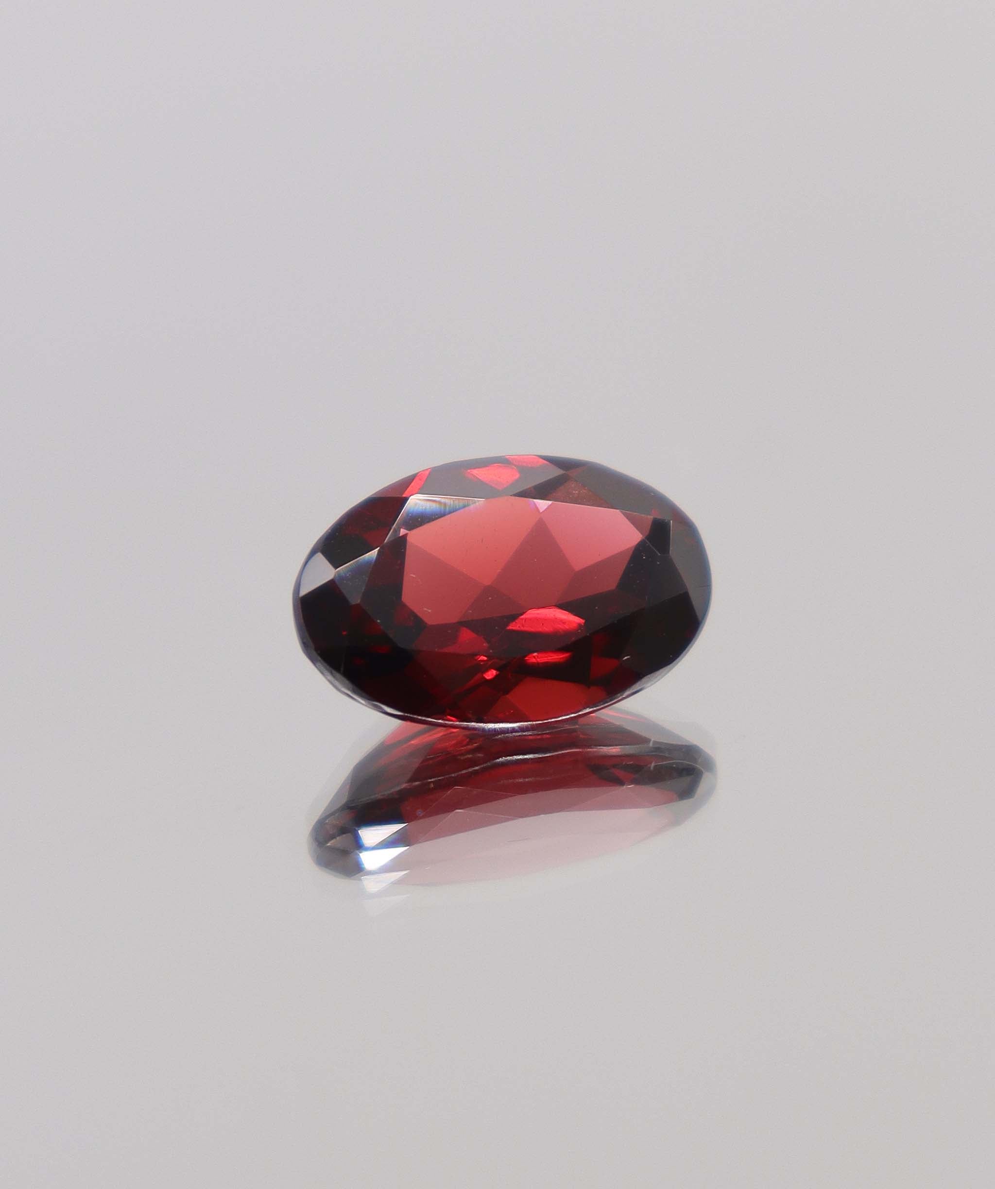 Luxury Promise 6.35ct Almandine Oval DXBCS0402