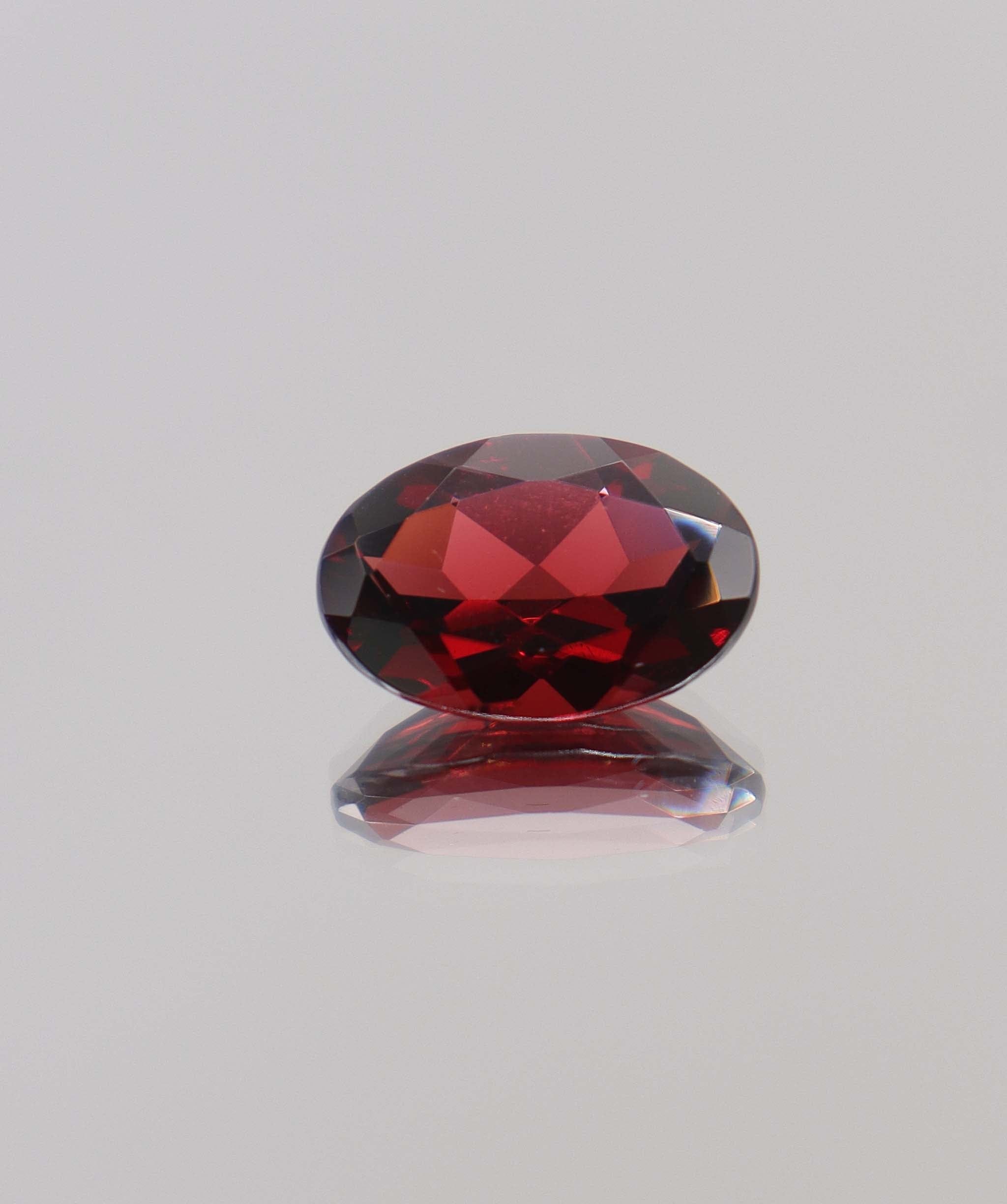 Luxury Promise 6.35ct Almandine Oval DXBCS0402