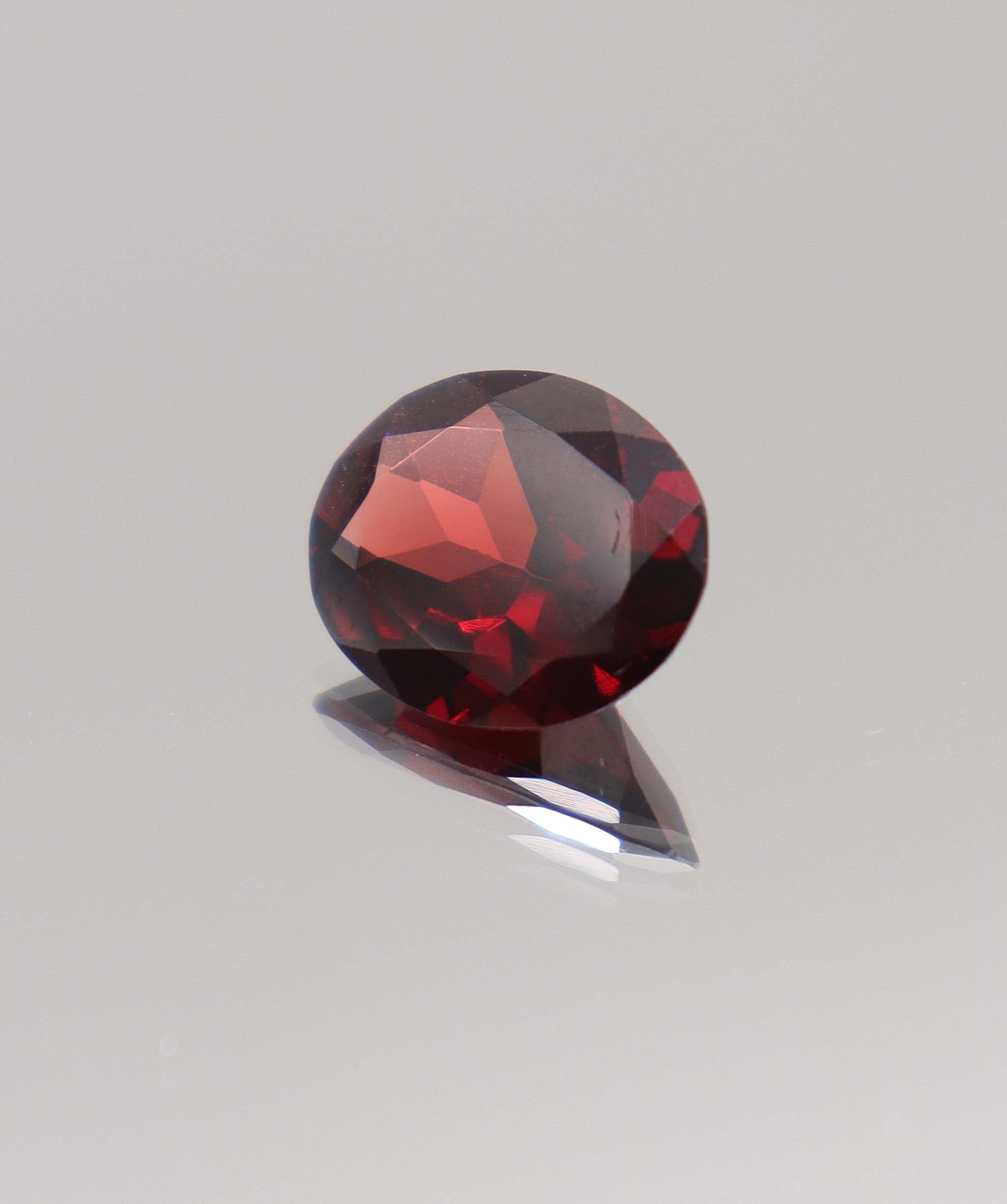 Luxury Promise 6.90ct Almandine Oval DXBCS0400