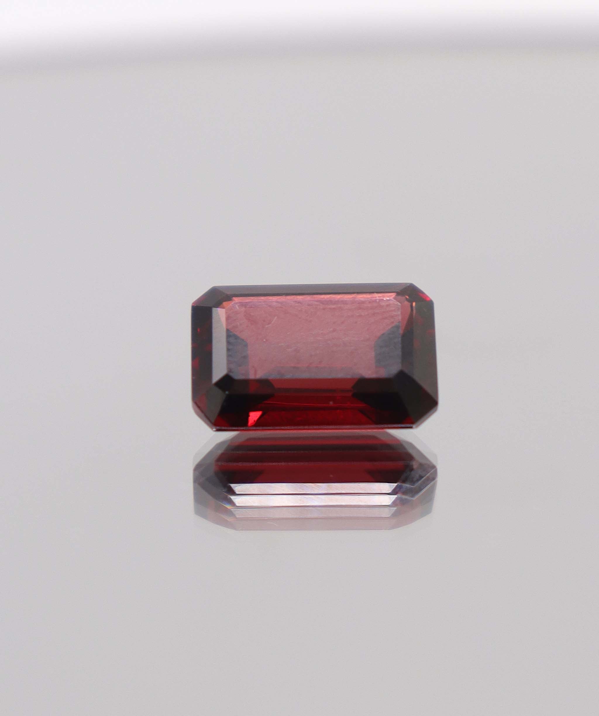 Luxury Promise 8.22ct Almandine Emerald cut DXBCS0406