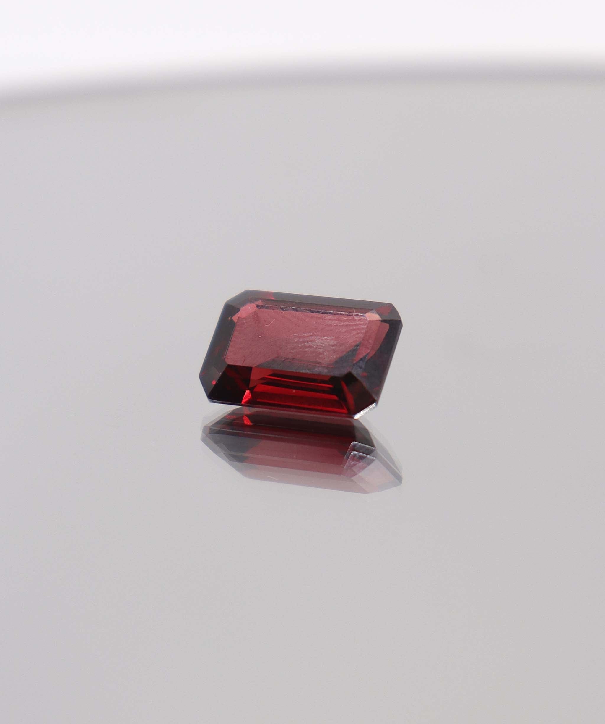 Luxury Promise 8.22ct Almandine Emerald cut DXBCS0406
