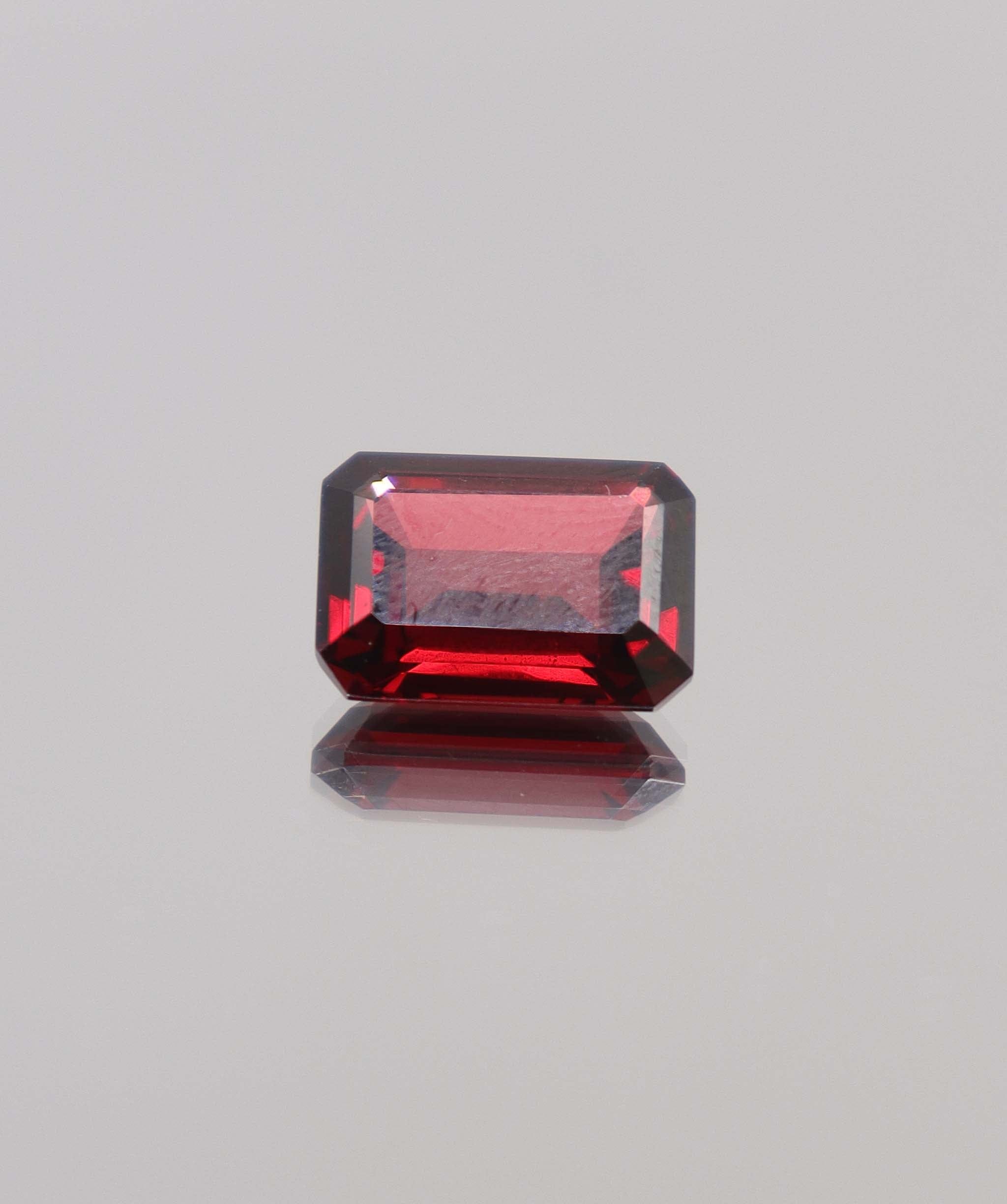 Luxury Promise 8.22ct Almandine Emerald cut DXBCS0406