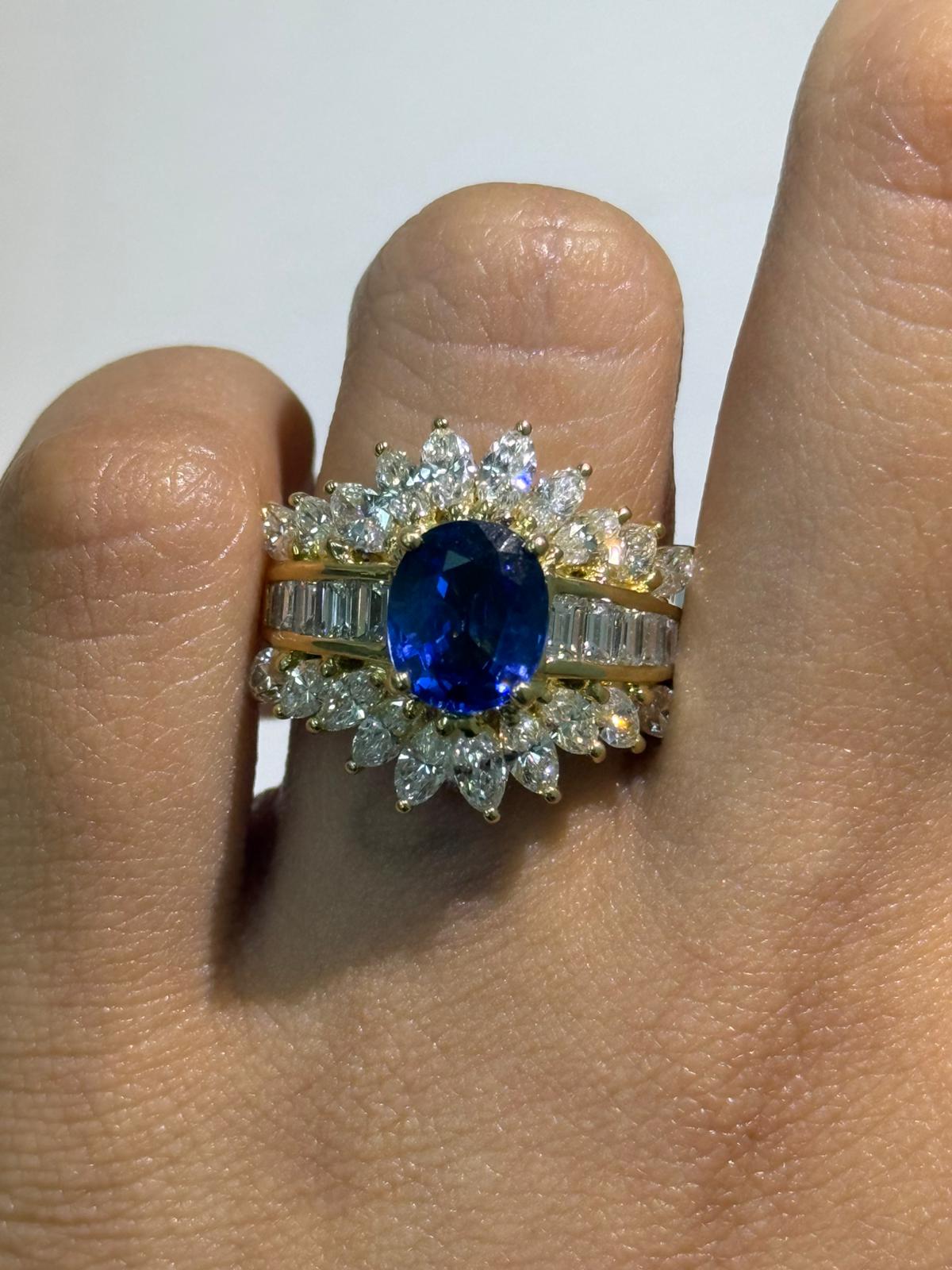 Luxury Promise Oval Sapphire Ring with Baguette Diamond Band and Marquise Diamond Cluster Halo in 18K / 10.61g, S2.57ct, D2.94ct / Size 5 US 024604 JJC0054