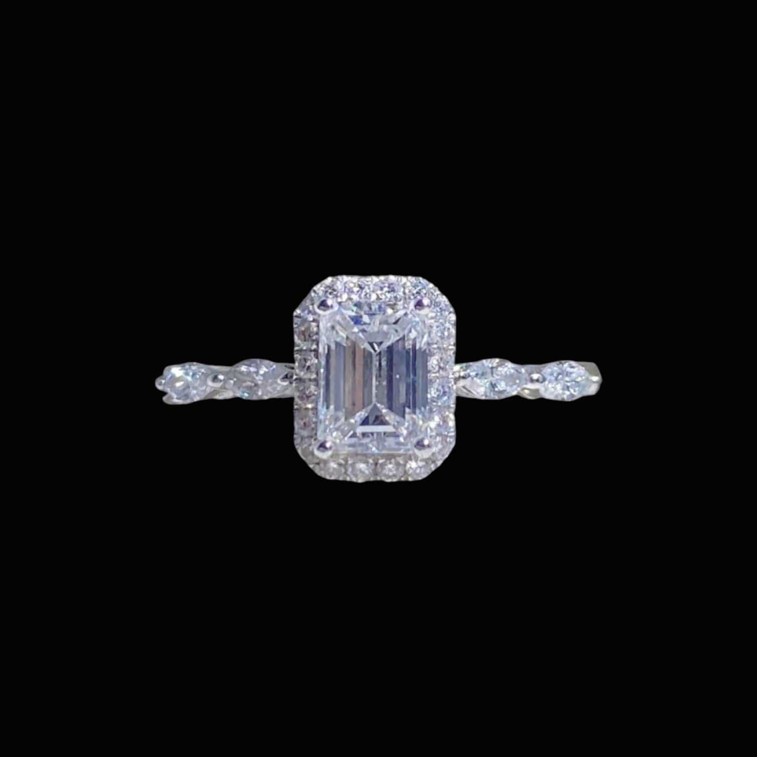 Luxury Promise 0.67ct & 0.22ct White Diamond Emerald Cut Ring set in 18K White Gold