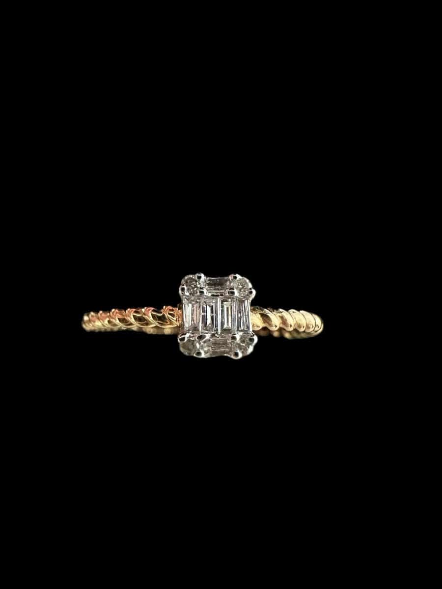 Baguette & Round Diamond Ring set in 18K Yellow Gold