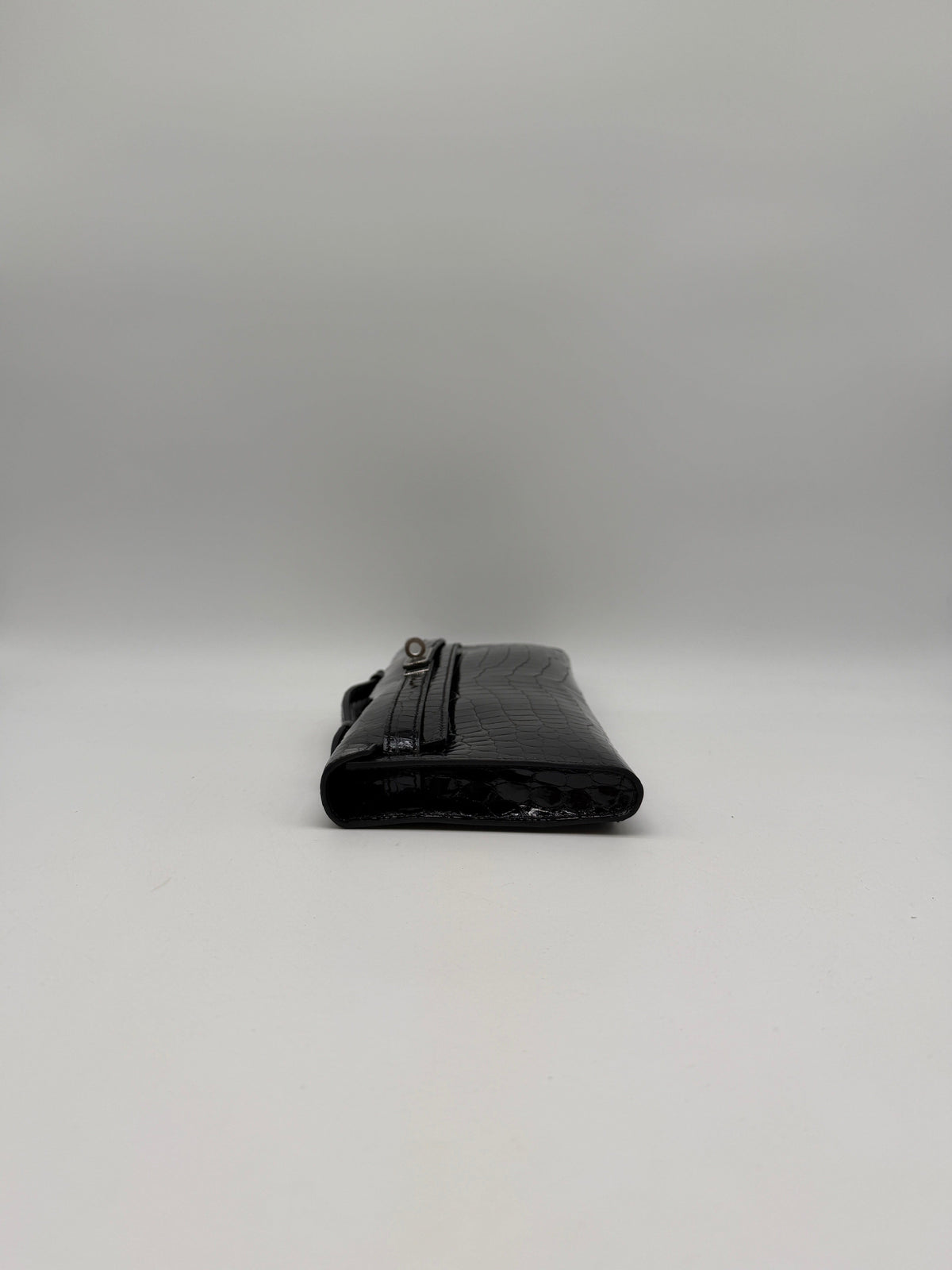 Prime Concierge Hermès Kelly Cut Black Shiny Porosus Palladium Hardware