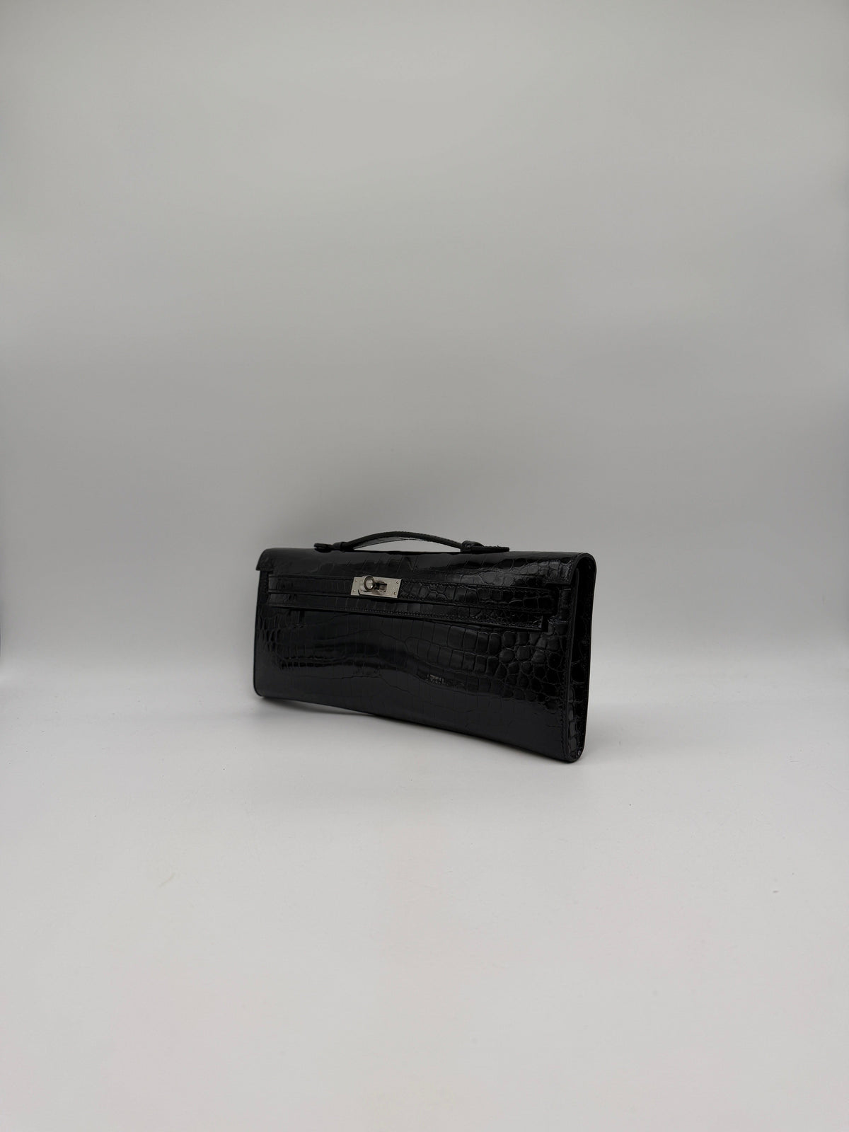 Prime Concierge Hermès Kelly Cut Black Shiny Porosus Palladium Hardware