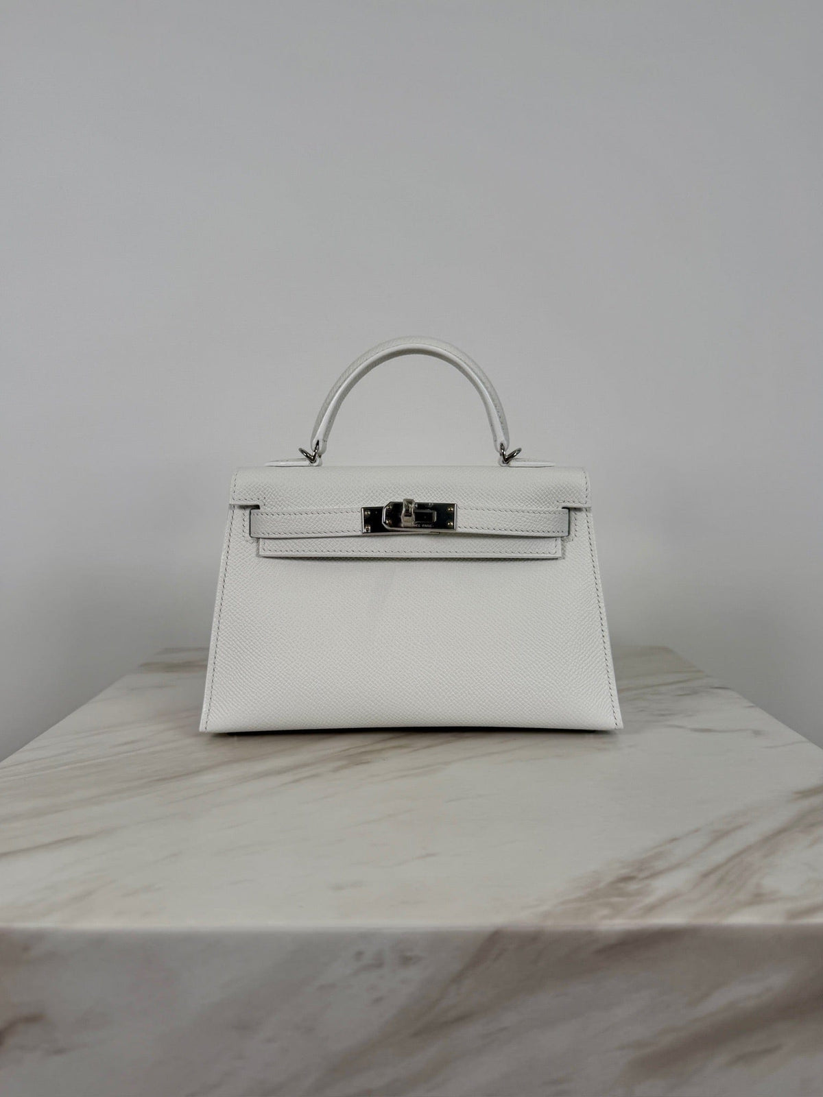 Prime Concierge Hermès Mini Kelly White Epsom Palladium Hardware