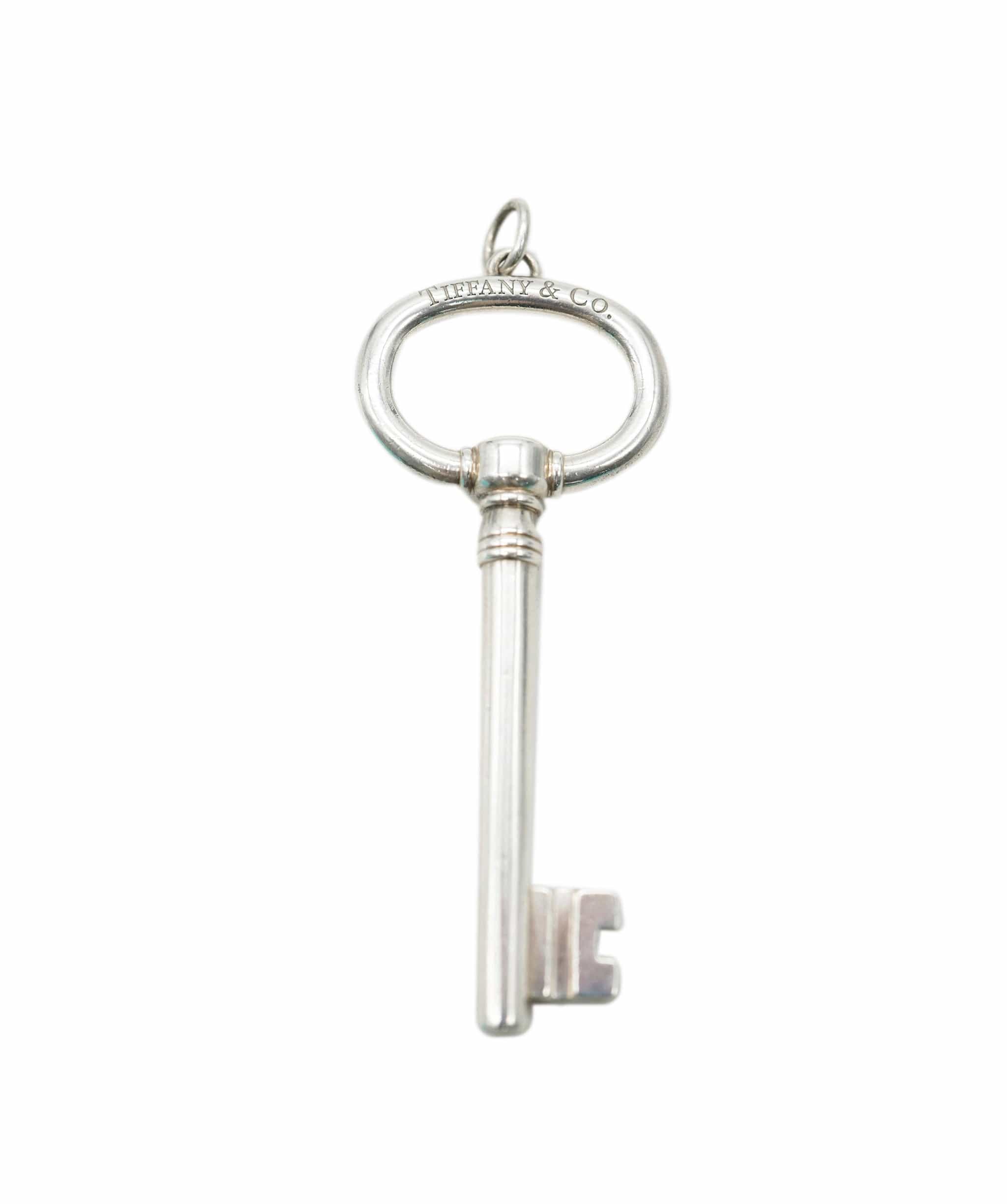 Tiffany & Co. Silver key charm and pouch (2qt) AHC1398 LuxuryPromise