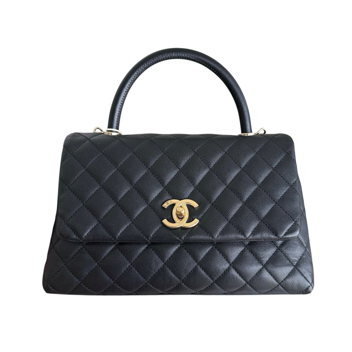 Luxury Evermore Chanel Coco Handle medium handbag in black quilted caviar leather with gold-tone CC turn-lock closure