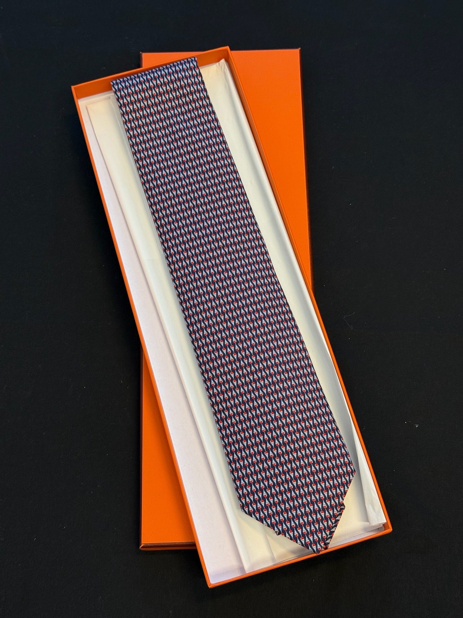 Hermès Silk Tie – Navy / Red Geometric Print image 1