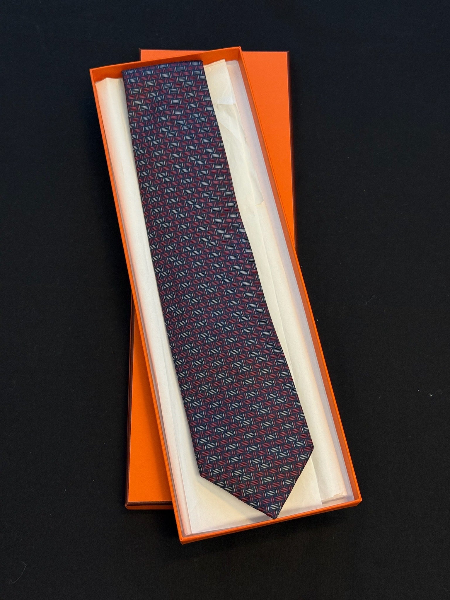 Hermès Silk Tie – Navy / Red Woven Geometric Print image 1