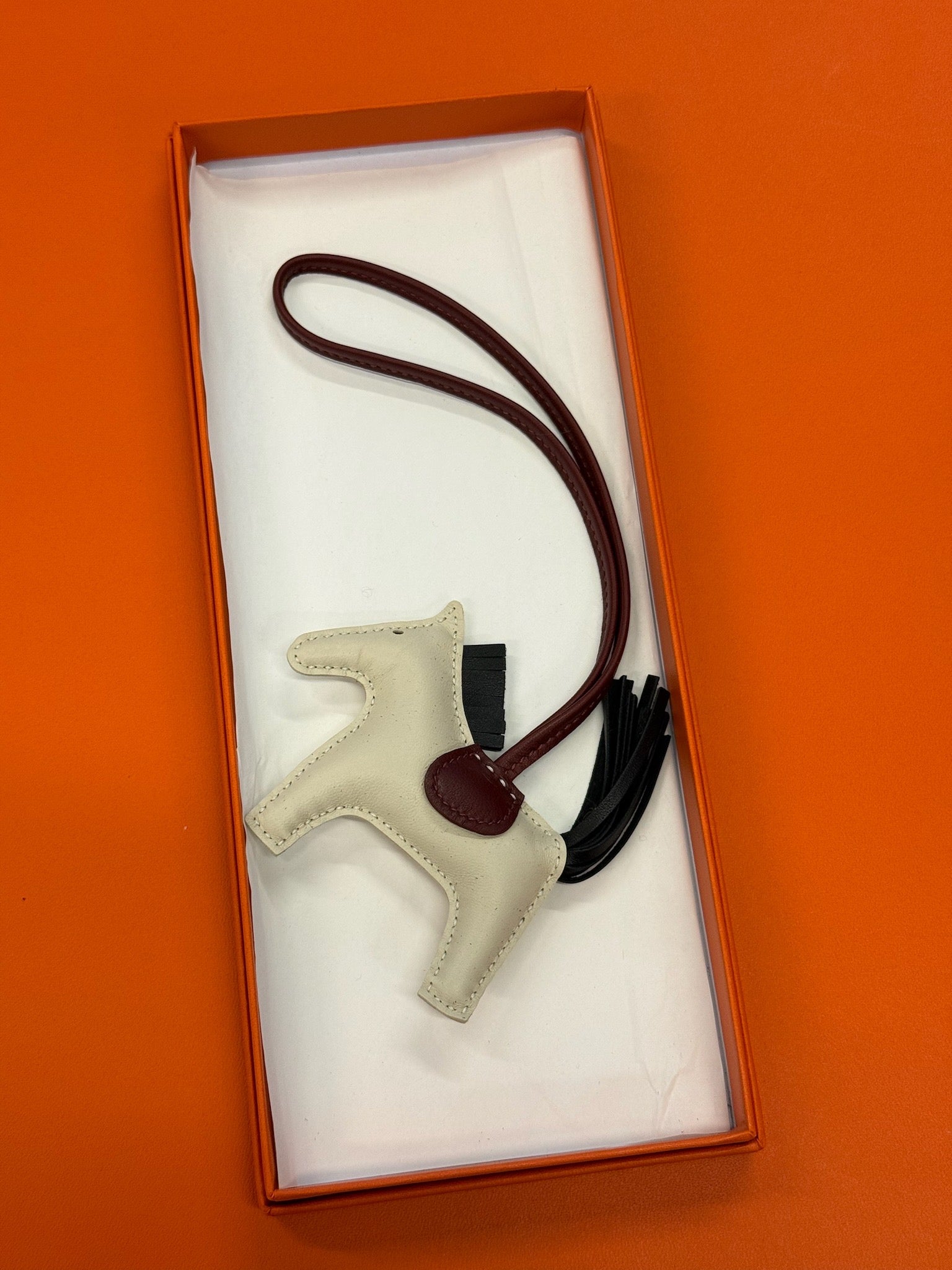 Hermès Rodeo Horse Bag Charm - Cream / Burgundy / Black image 1