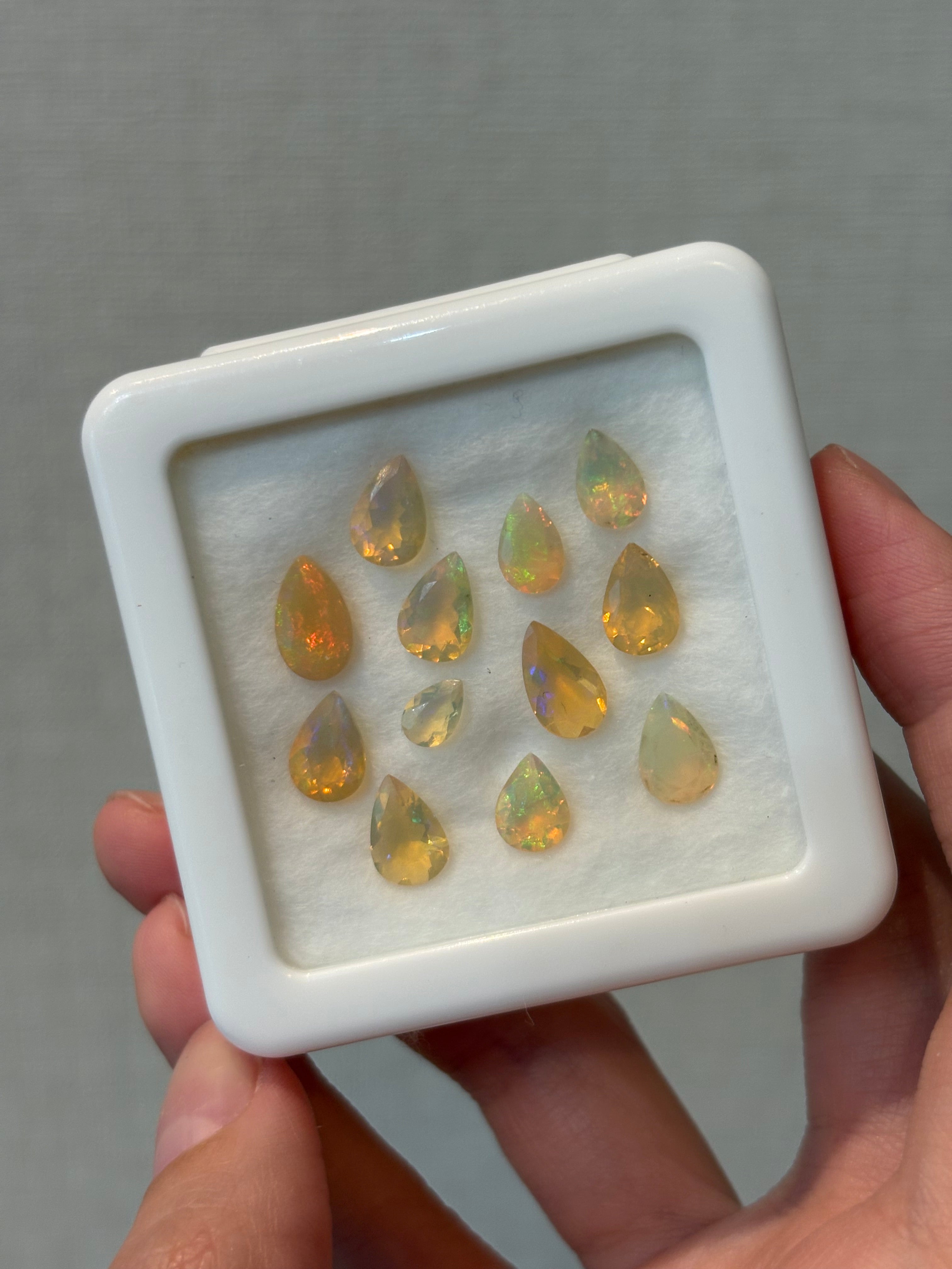 7.95ct White Opal Faceted Pear Set (12 pcs) THAIC0425