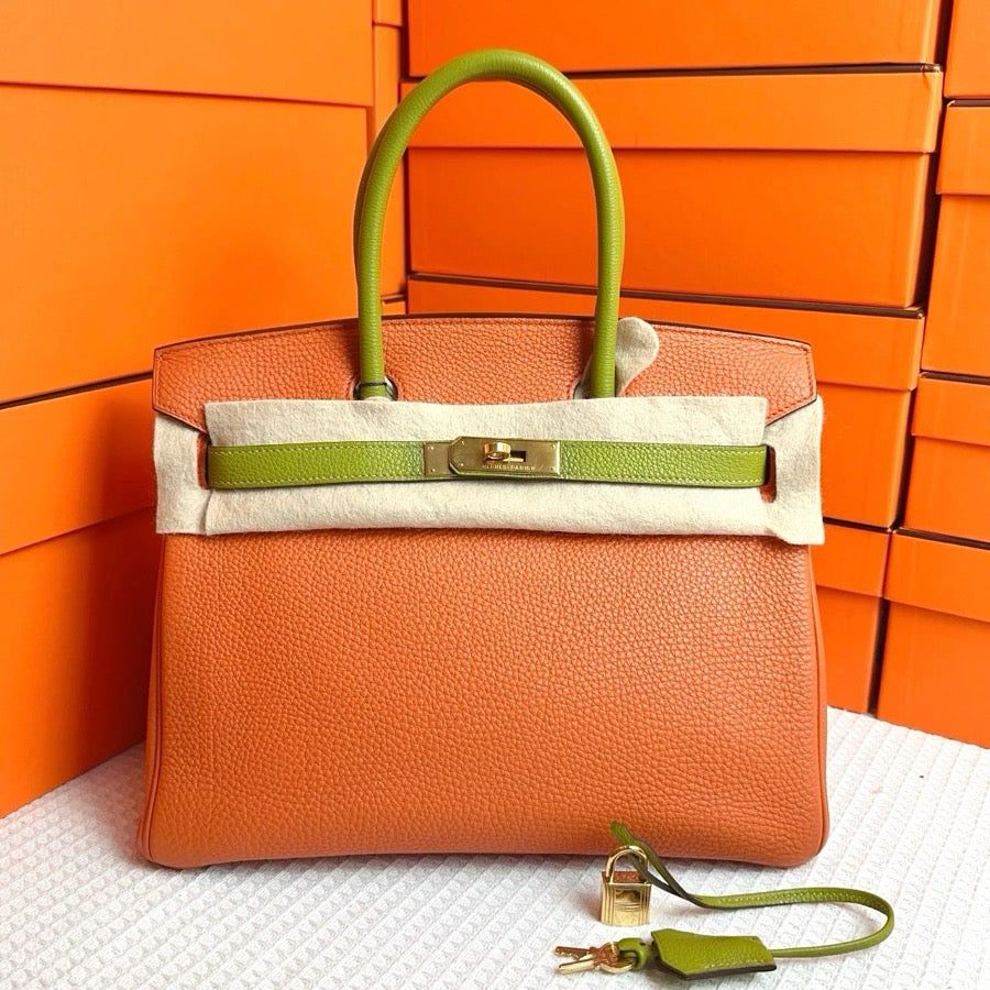 Hermes Birkin 30, Hermes orange and fennel green color blocking, gold hardware, G engraving on the frame, Togo leather. SYC2163