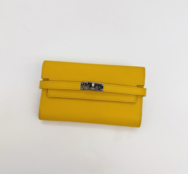 Hermes ginger yellow Kelly wallet with silver clasp, size 16 (M). 18353063