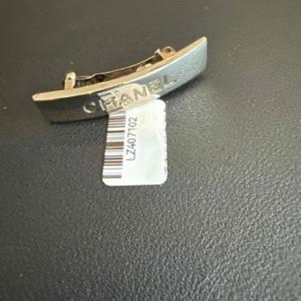 CHANEL hair clip with silver lettering LZ407102