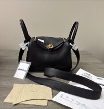HERMES Lindy mini black and gold handbag/crossbody bag 3032603186373