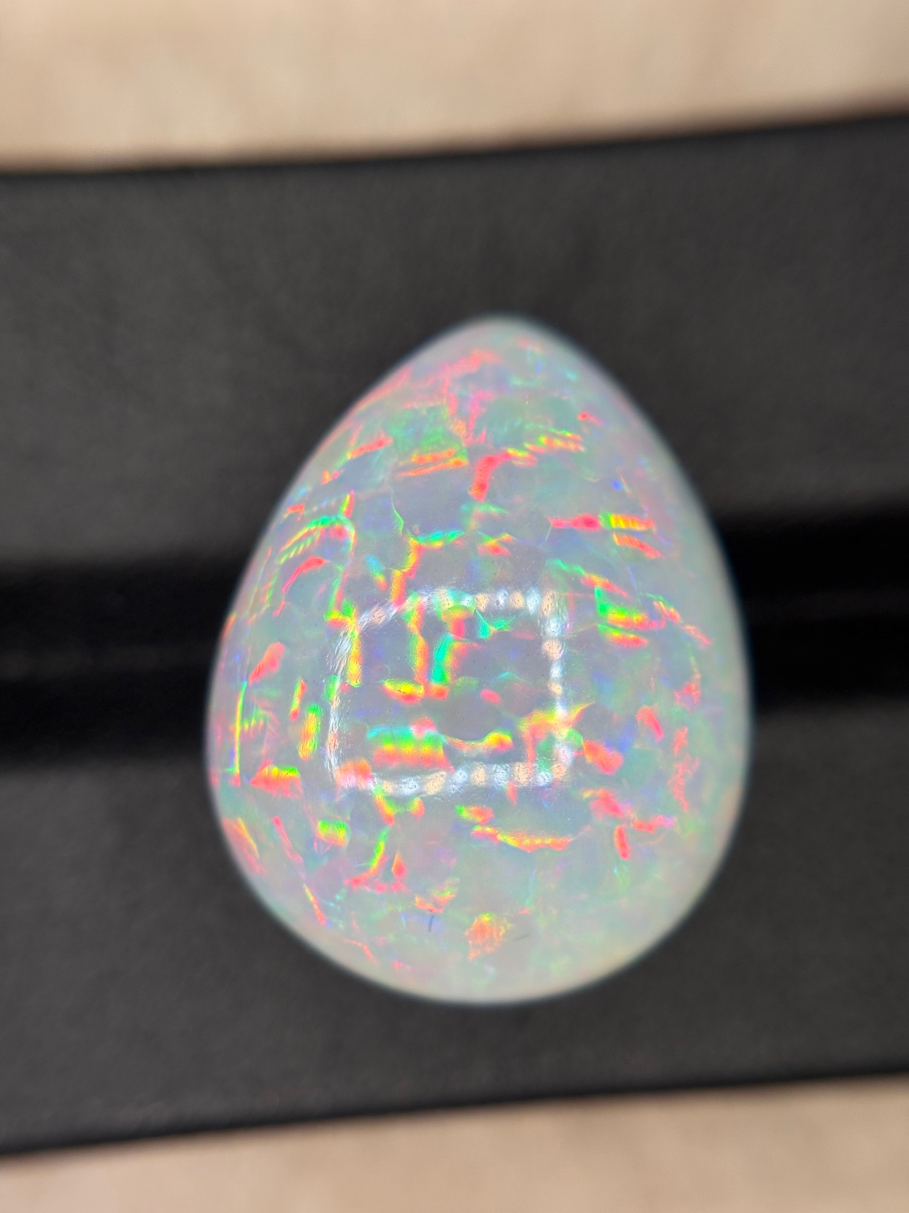 21.55ct White Opal Cab Oval THAIC0470