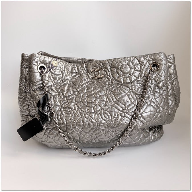CHANEL Silver Camellia PVC Tote C19491813560