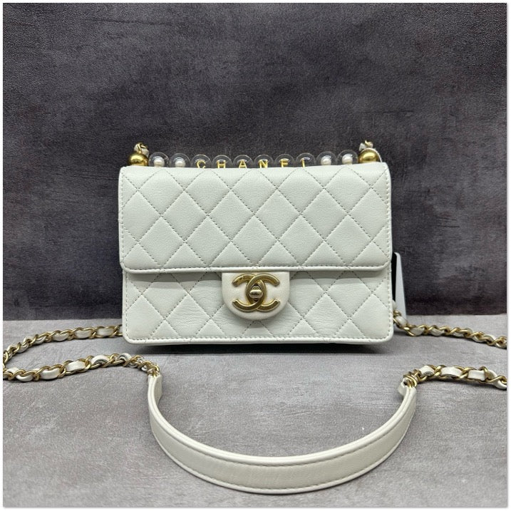 Chanel pearl letter handle WOC C19494355506