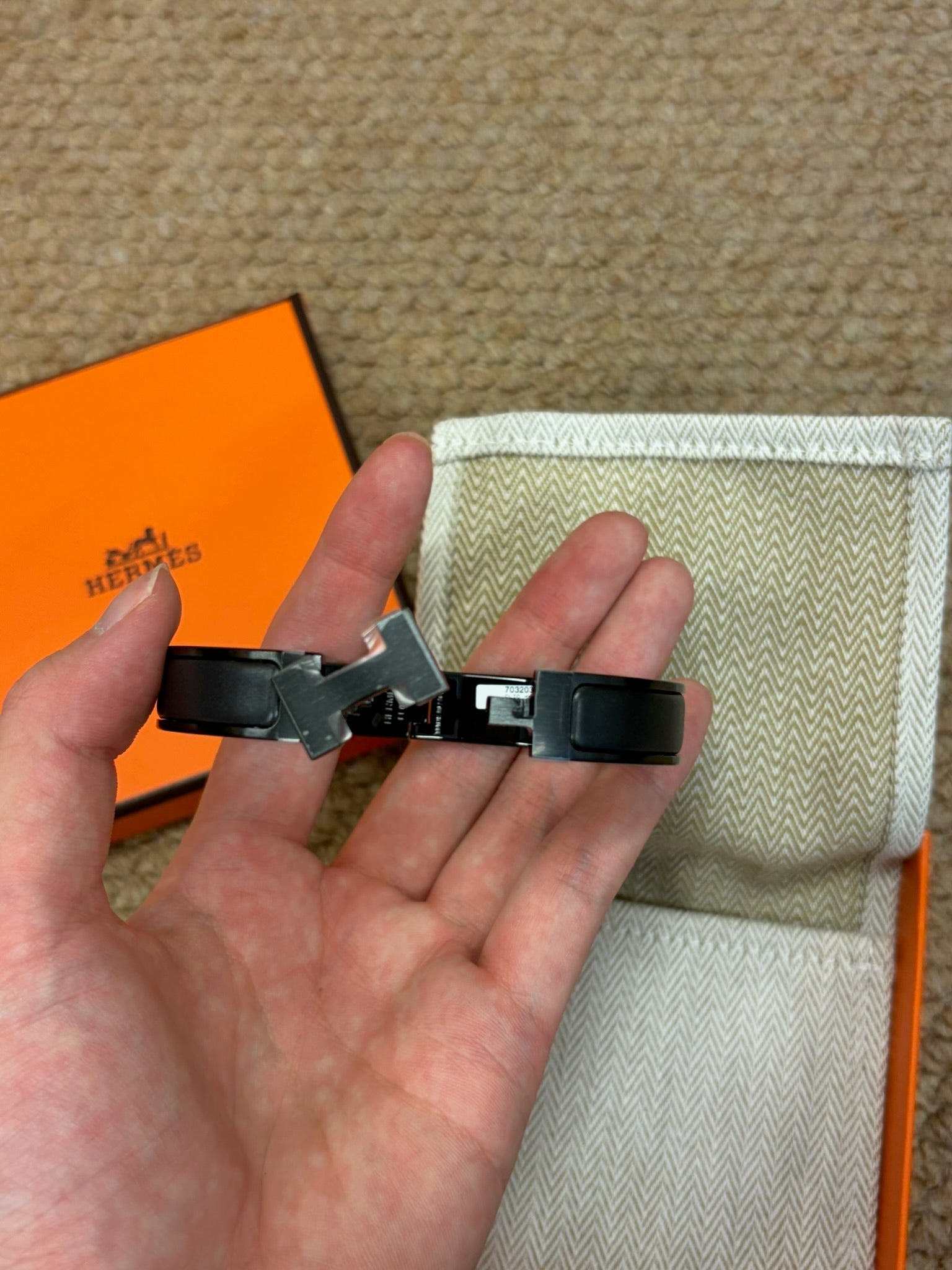 Hermès black H bracelet detail