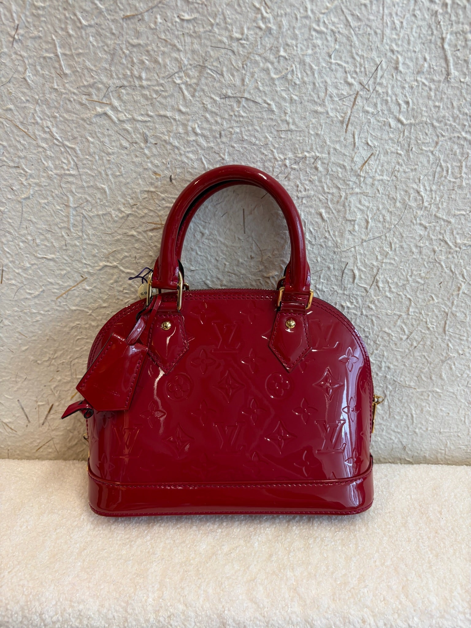 Louis Vuitton Alma BB dark red main image