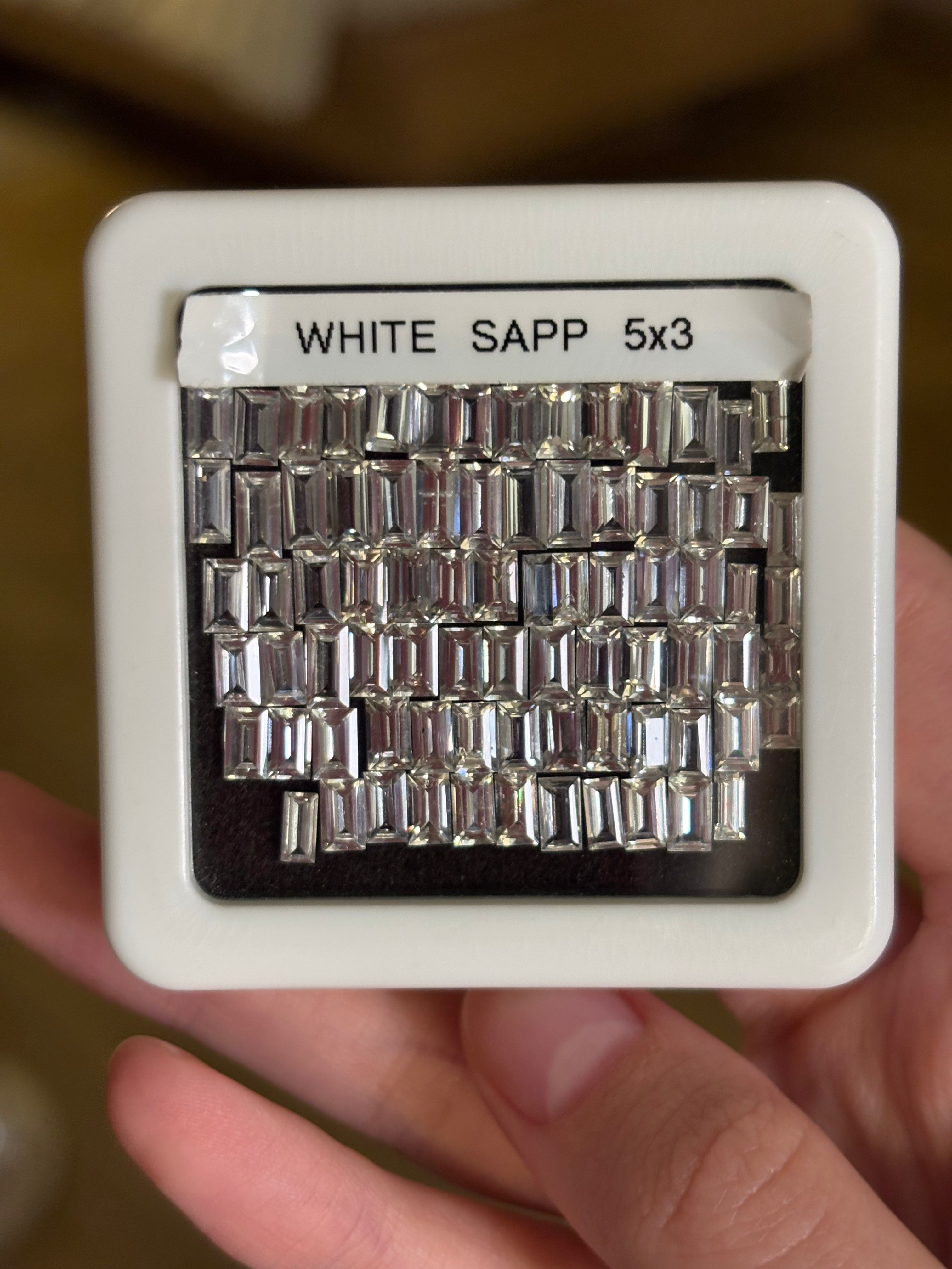 30.37ct White Sapphire Emerald Cut Calibrated 5x3 DXBCD1239