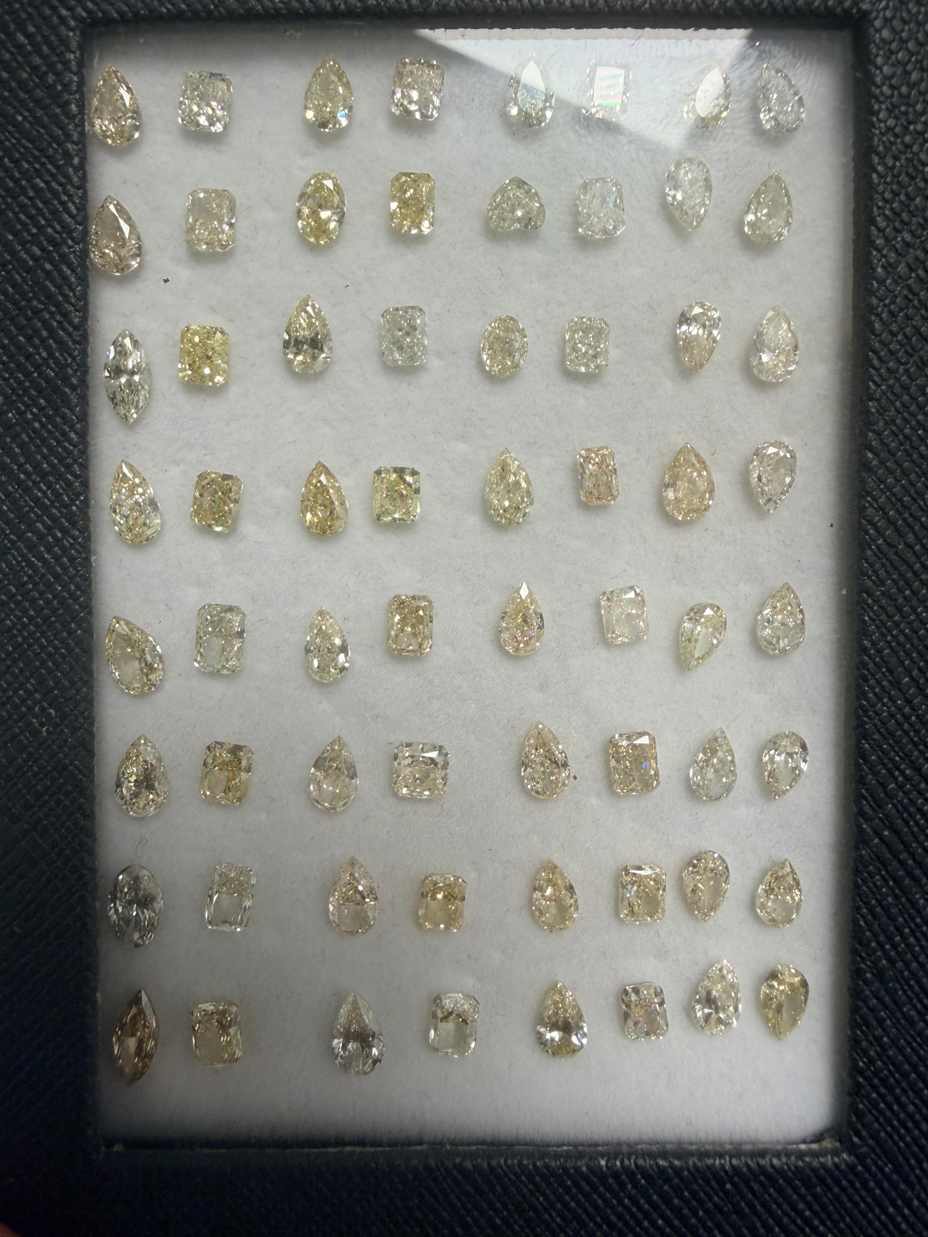 0.7 ct Fancy Yellow Diamond  Pair Stud Set