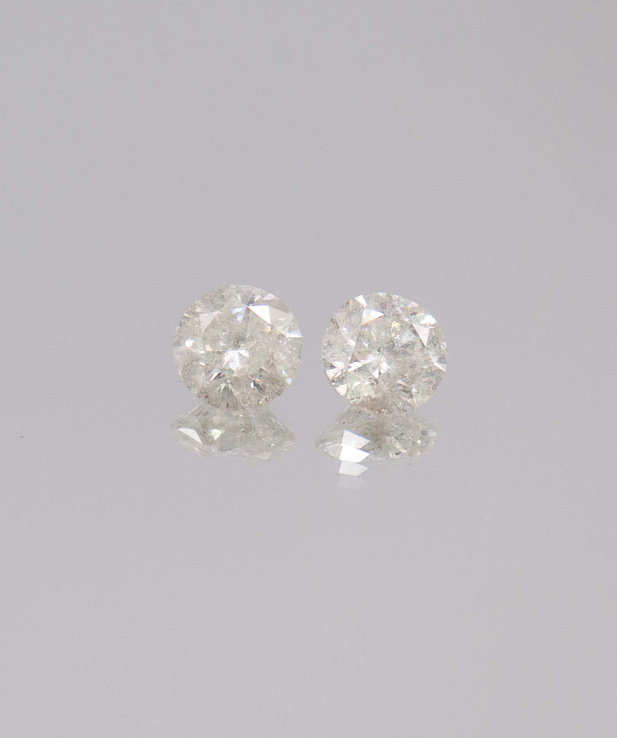 5.17CT D-G COMMERCIAL ROUND DIAMOND PAIR DXBS6726
