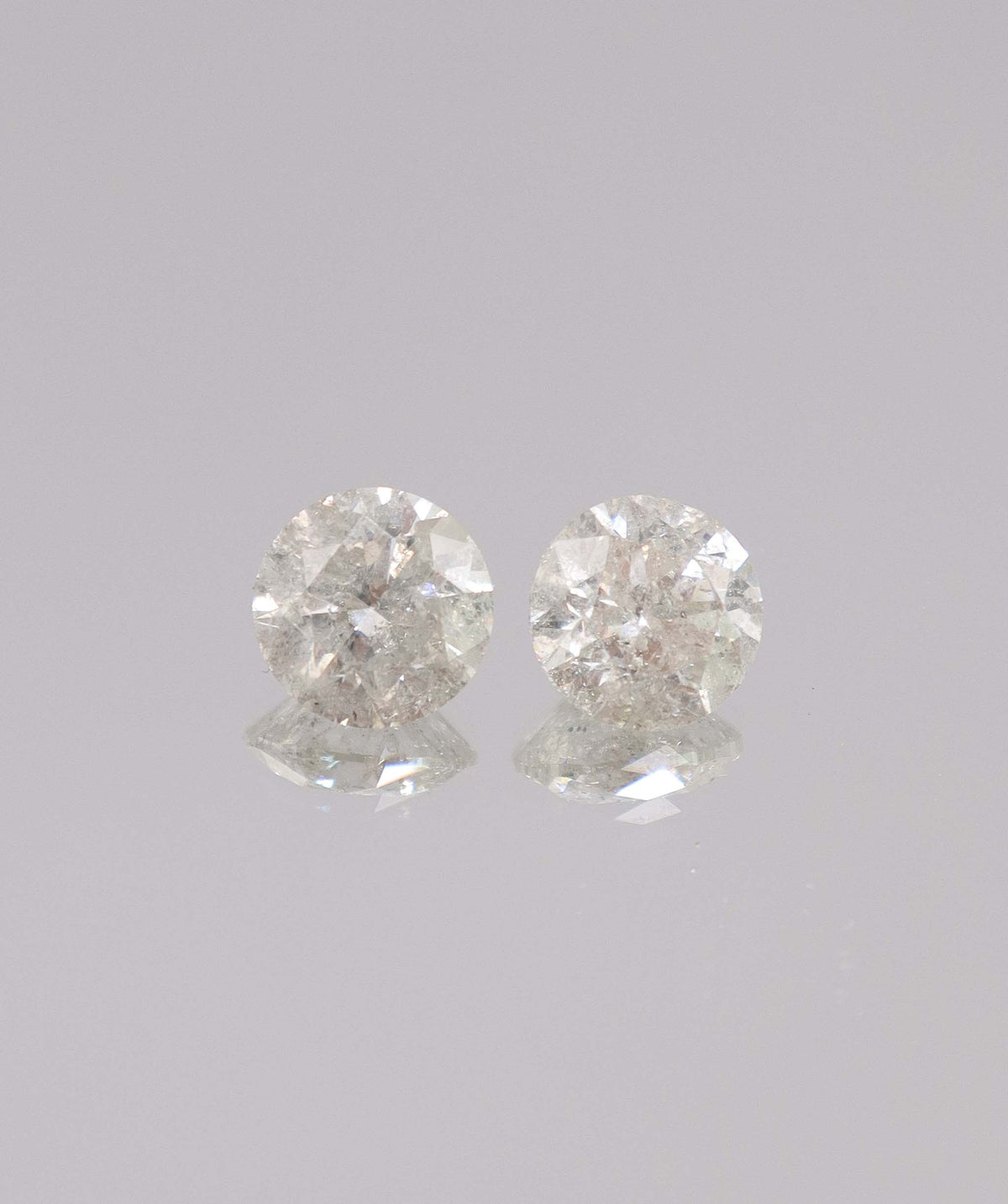5.17CT D-G COMMERCIAL ROUND DIAMOND PAIR DXBS6726