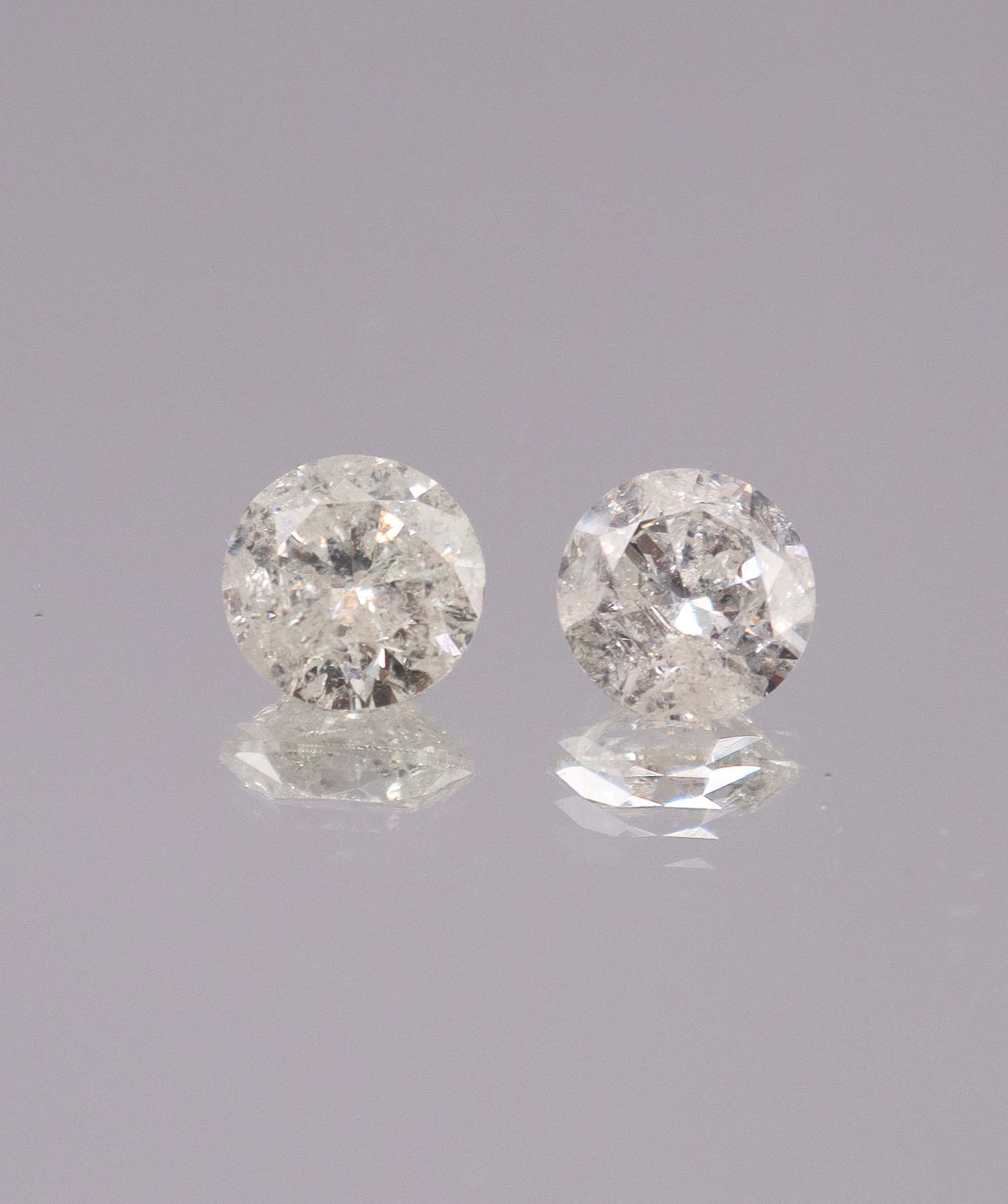 4.03CT D-G COMMERCIAL ROUND DIAMOND PAIR DXBS6715