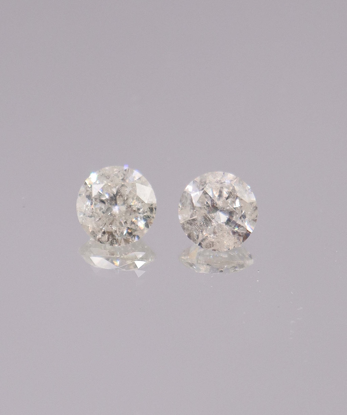 4.03CT D-G COMMERCIAL ROUND DIAMOND PAIR DXBS6715