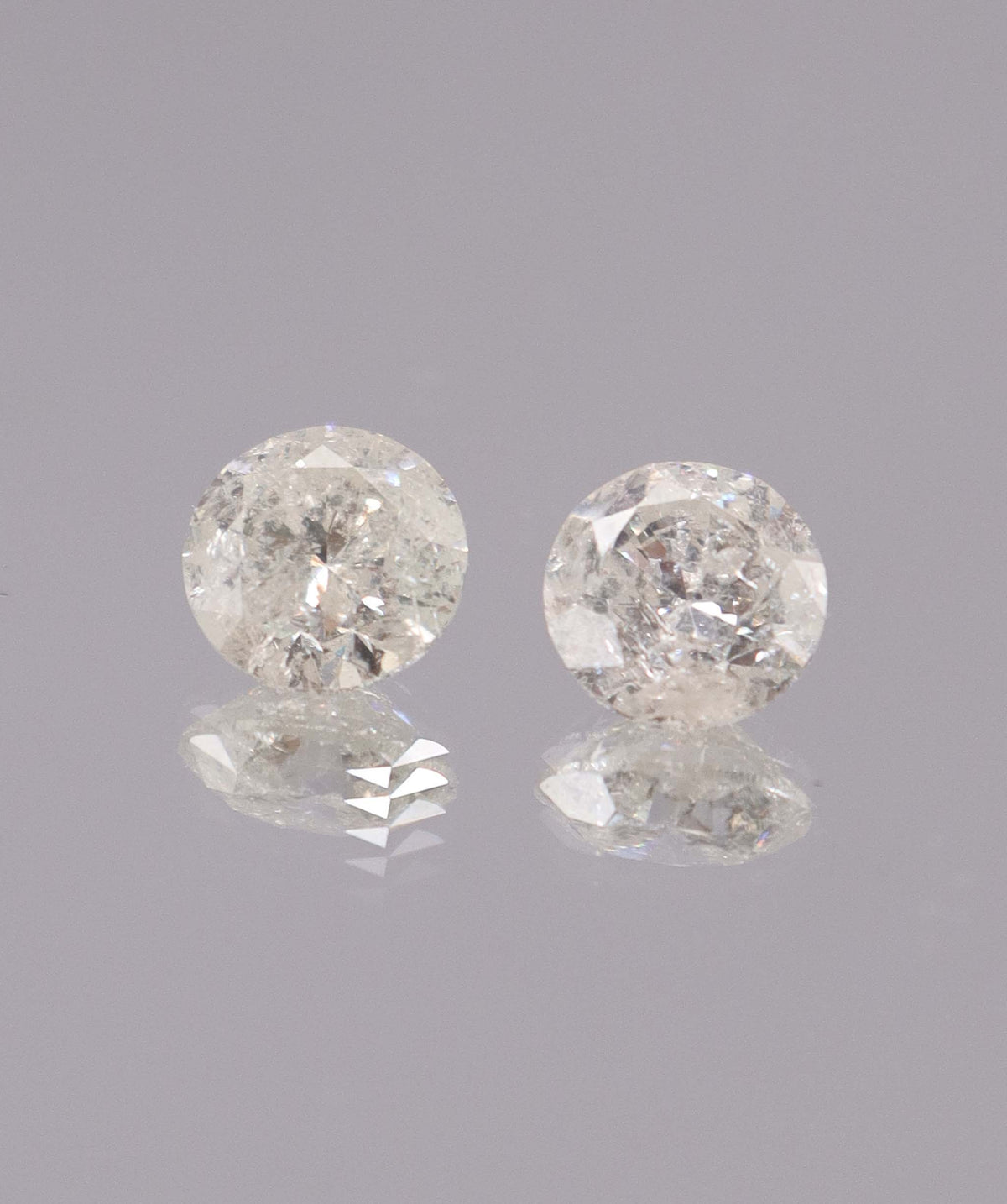 4.03CT D-G COMMERCIAL ROUND DIAMOND PAIR DXBS6715