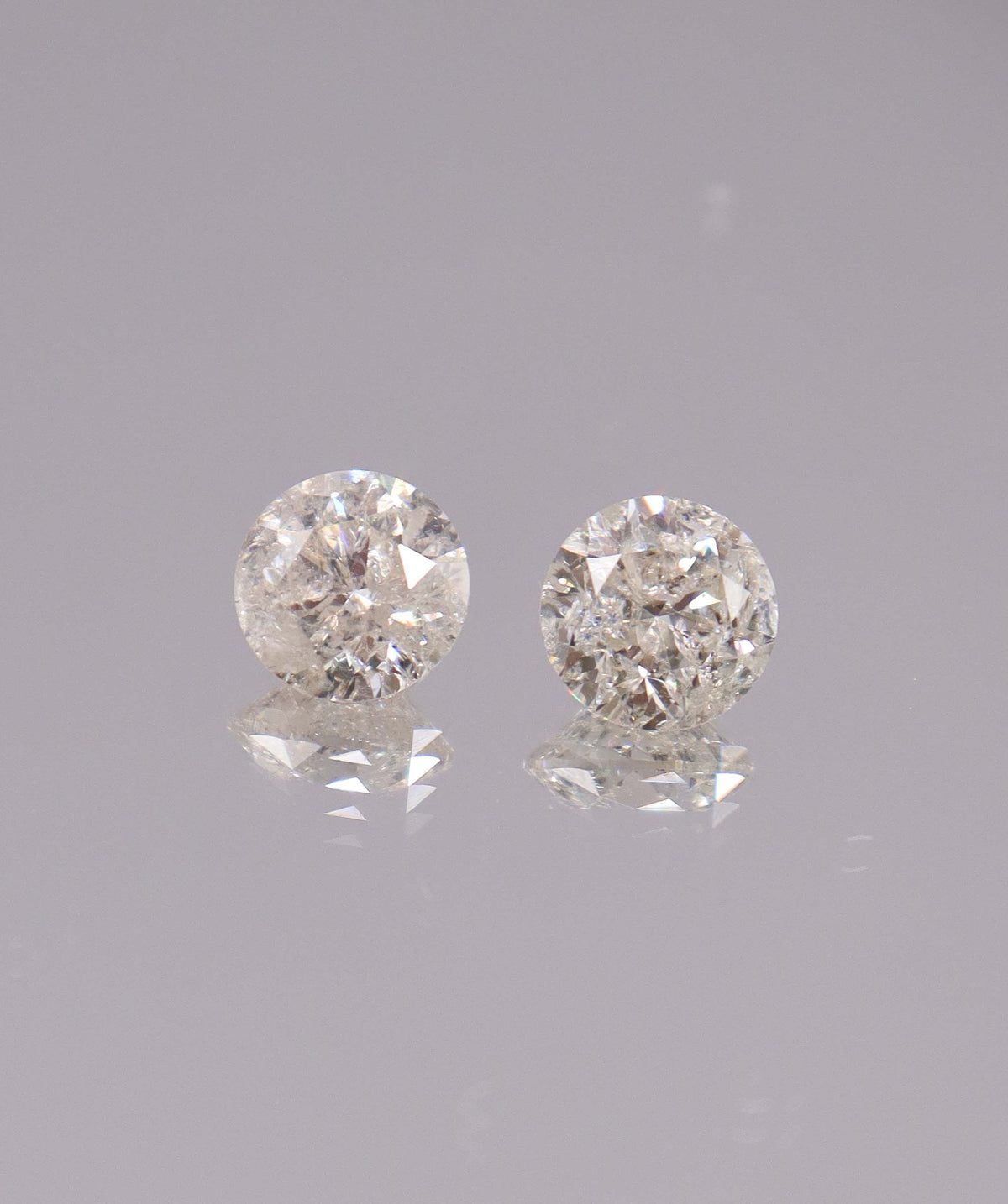 4.08CT D-G COMMERCIAL ROUND DIAMOND PAIR DXBS6723