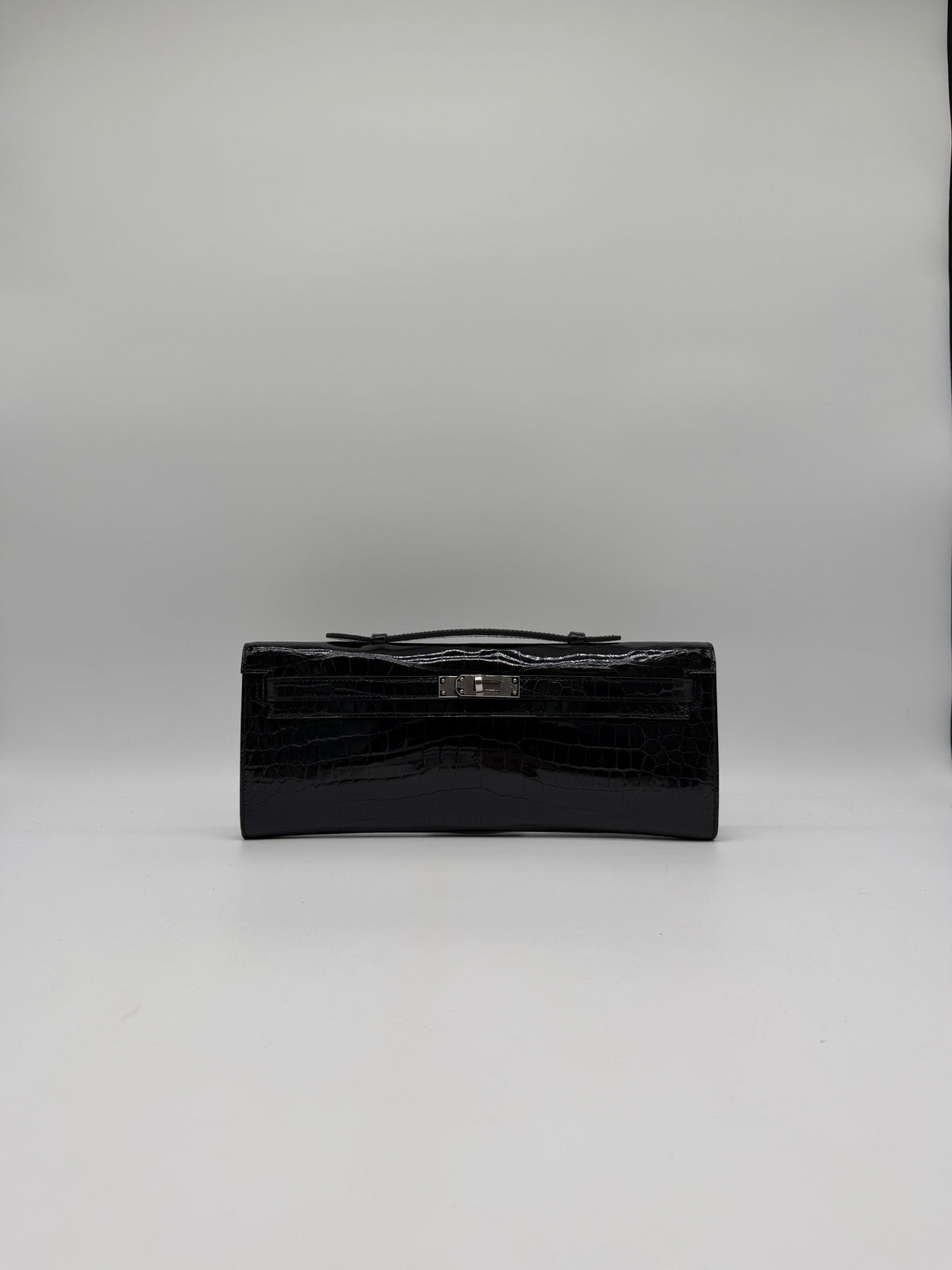 Hermès Kelly Cut Black Shiny Porosus Palladium Hardware