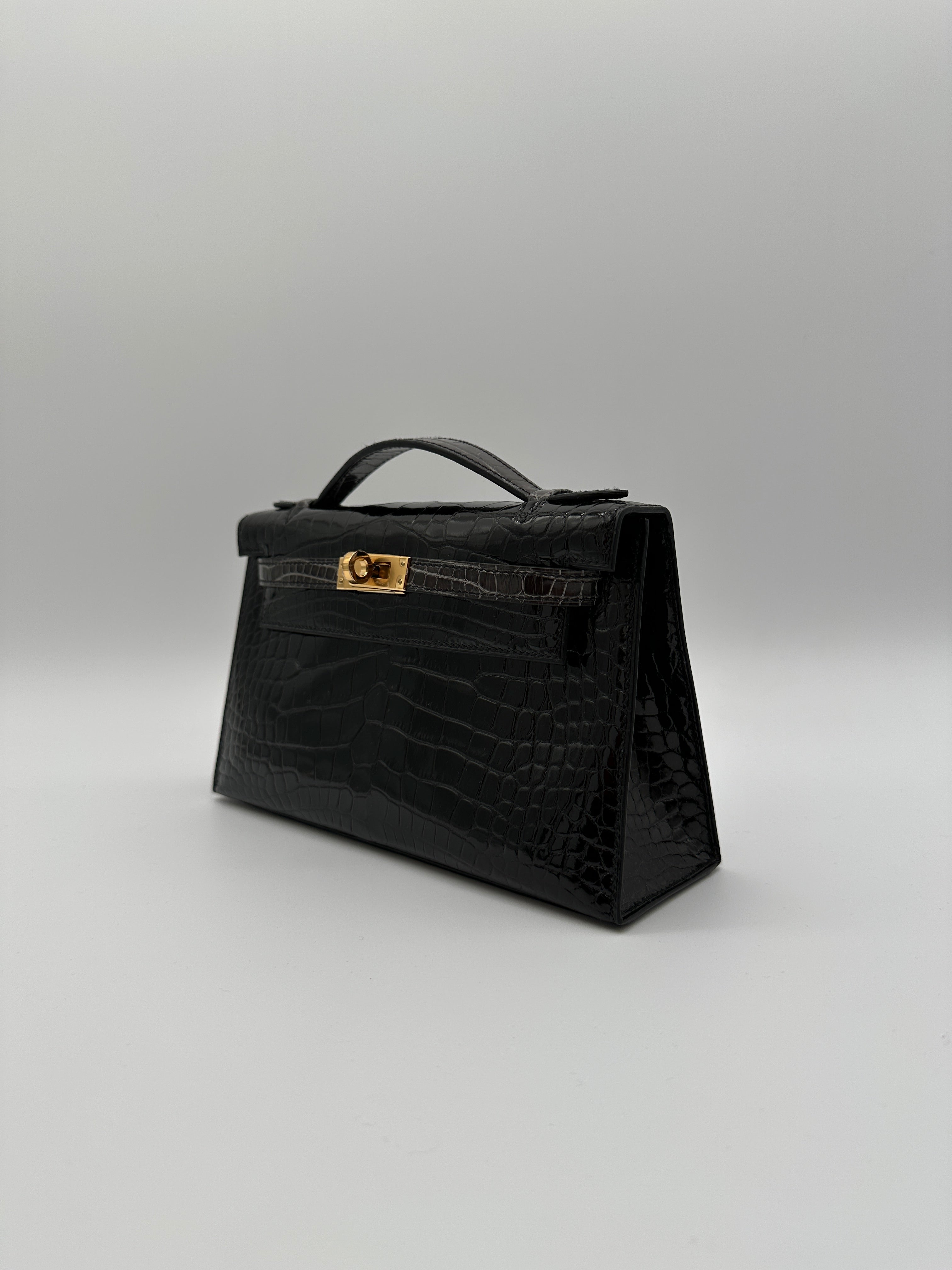 Hermès Kelly Pochette HSS Black/Graphite Shiny Alligator Gold Hardware