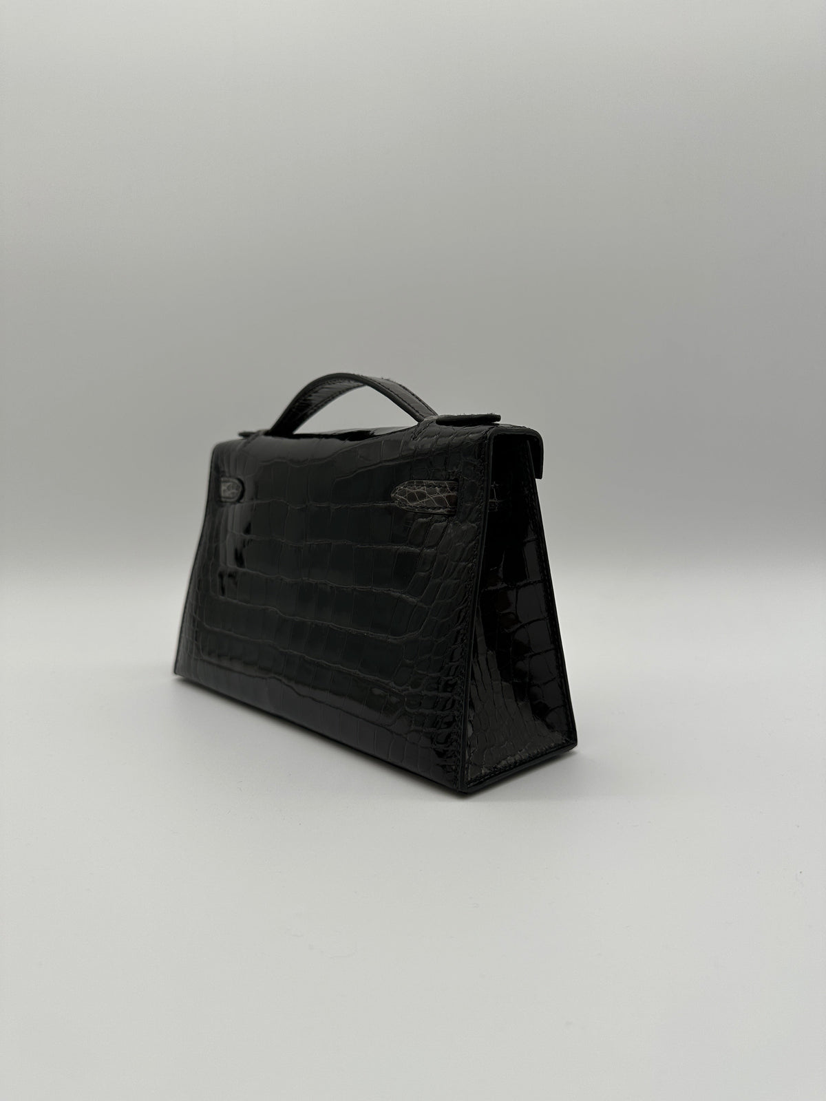 Hermès Kelly Pochette HSS Black/Graphite Shiny Alligator Gold Hardware