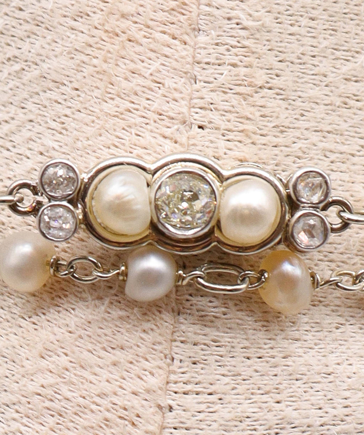 An Art Deco Pearl and Diamond Chain WA25672