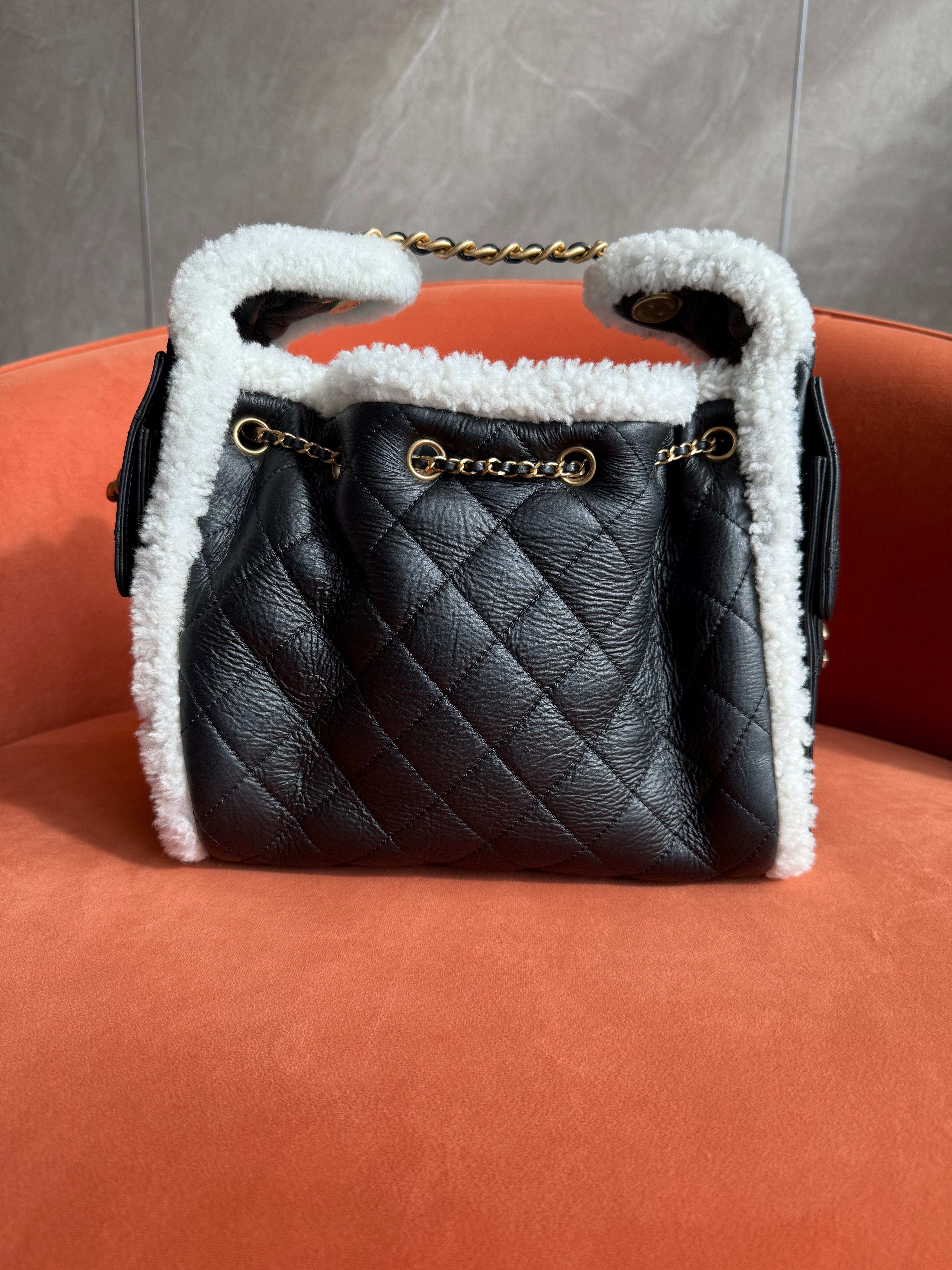 Aureon Group Limited *LONDON LOCATED* CHANEL 25 SMALL HANDBAG BLACK & WHITE Crumpled Shearling Sheepskin with Gold Tone Metal