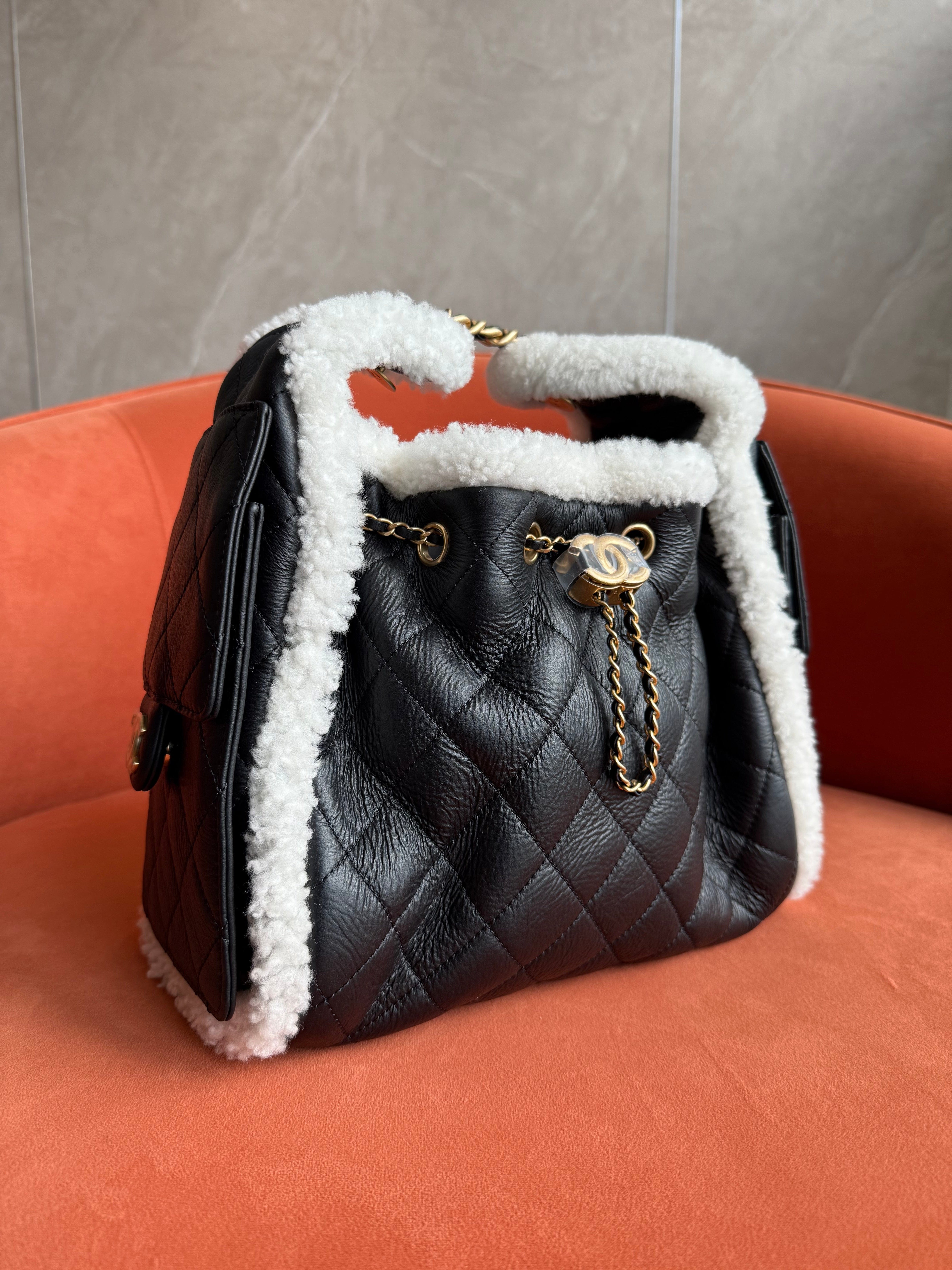 Aureon Group Limited *LONDON LOCATED* CHANEL 25 SMALL HANDBAG BLACK & WHITE Crumpled Shearling Sheepskin with Gold Tone Metal