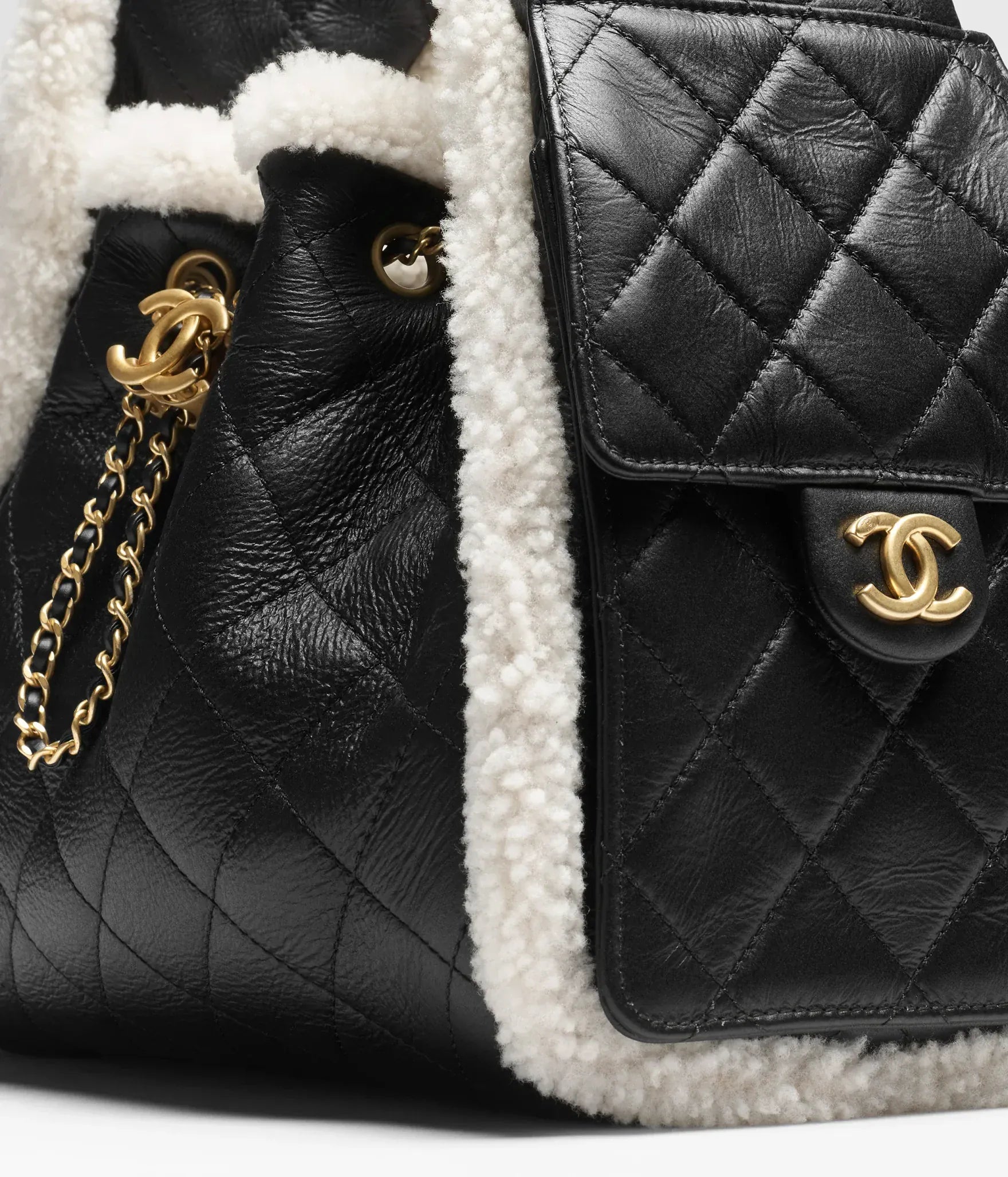 Aureon Group Limited *LONDON LOCATED* CHANEL 25 SMALL HANDBAG BLACK & WHITE Crumpled Shearling Sheepskin with Gold Tone Metal