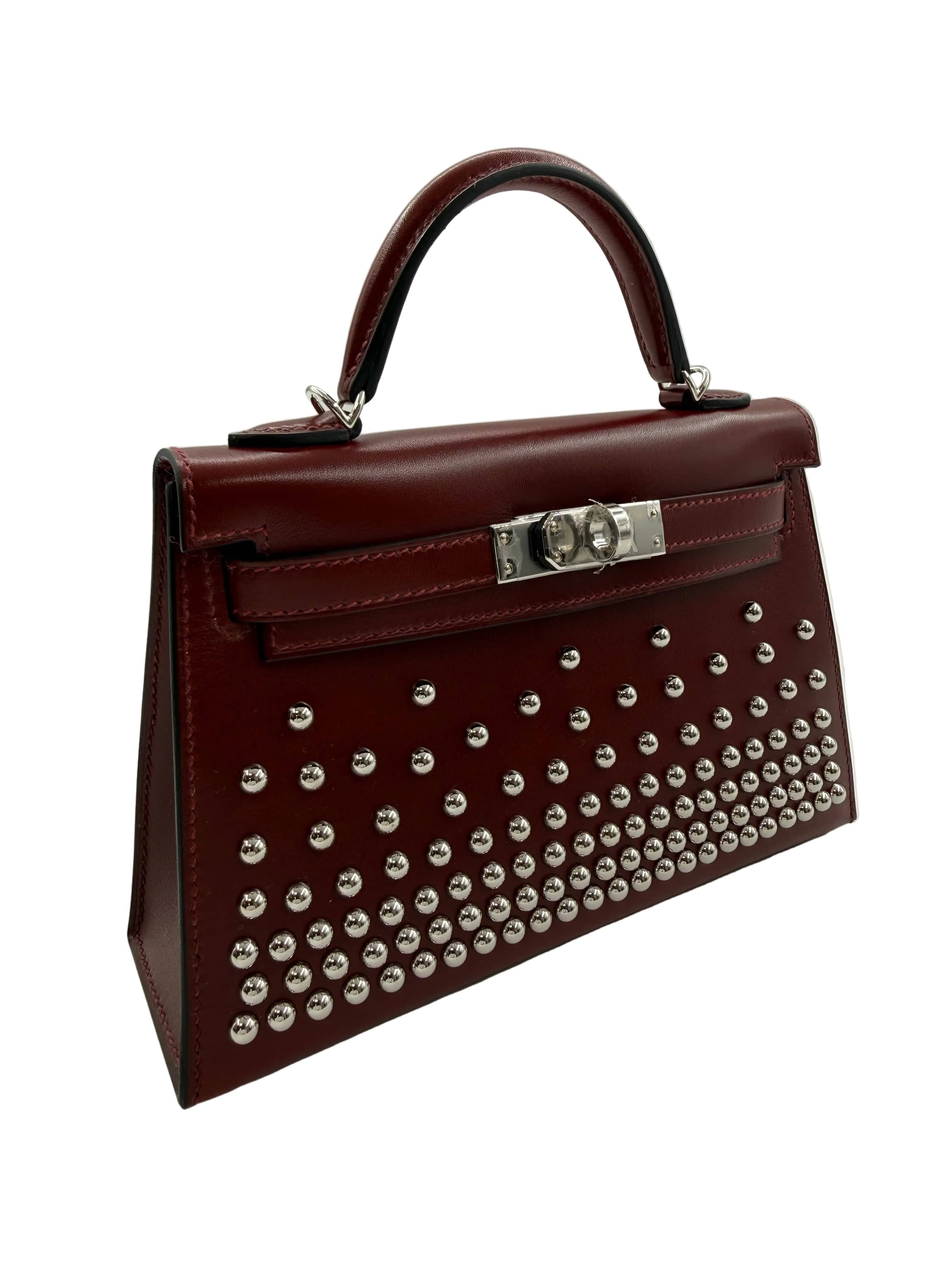 Aureon Group Limited *LONDON LOCATED* HERMÈS MINI KELLY II 20CM "CLOUTE" ROUGE H Box Leather with Palladium Hardware