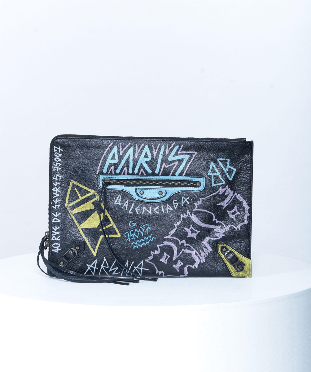 Balenciaga graffiti clutch best sale